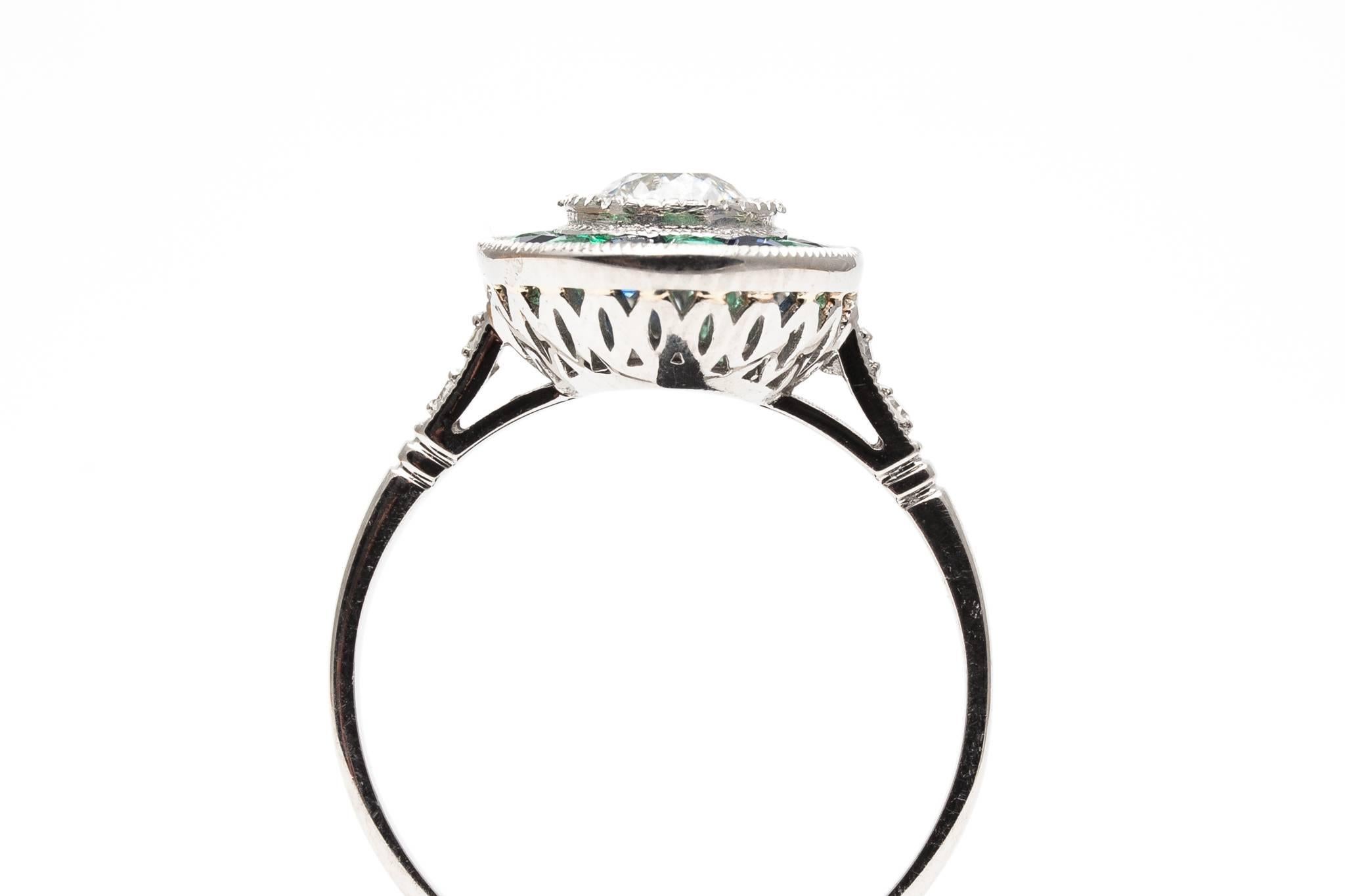 Exciting Emerald, Sapphire and Diamond Target Ring in Platinum For Sale 1