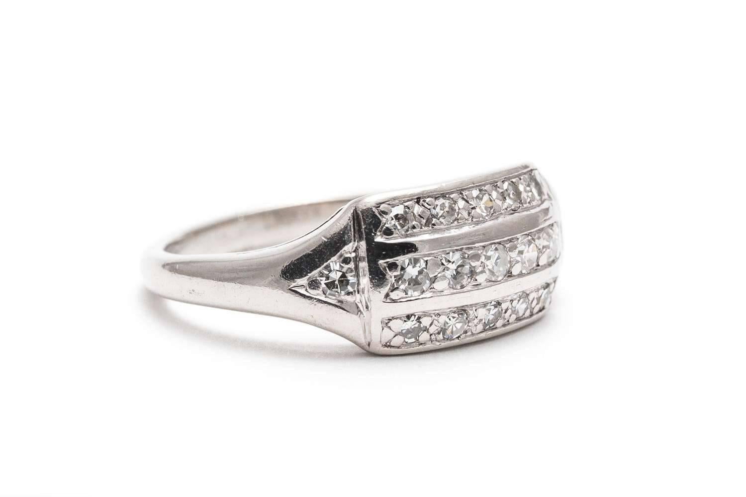 An art deco period diamond wedding band in luxurious platinum. Set with seventeen antique Swiss cut diamonds their ring features all top quality VS clarity and F/G colorless diamonds. Weighing a combined 0.51 carats, the seventeen diamonds are