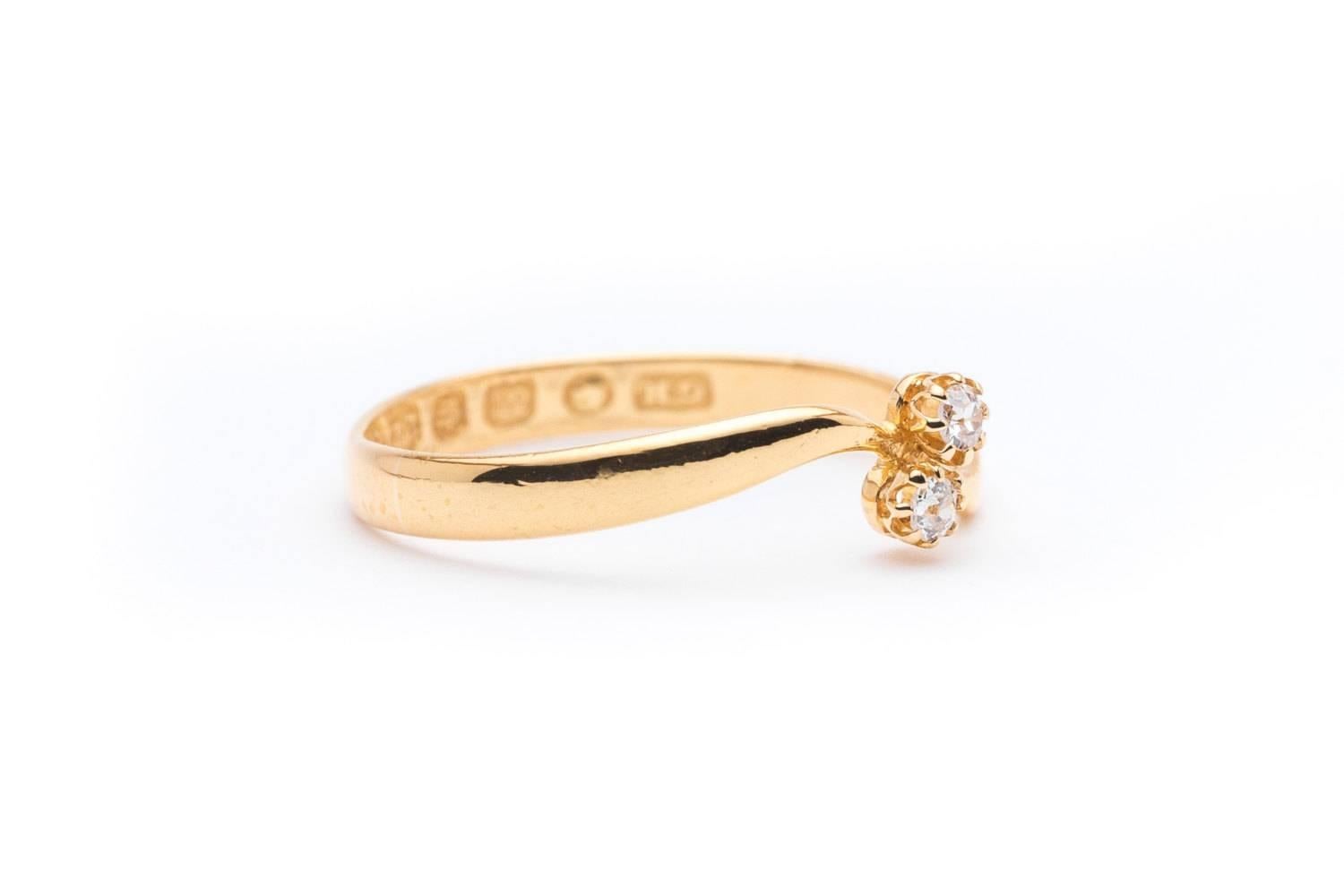 Beacon Hill Jewelers Presents:

An English 22 karat yellow gold toi et moi diamond ring hallmarked for Birmingham England. Featuring two old mine cut diamonds, this ring is a classic example of a timeless and desirable toi et moi ring.

In excellent