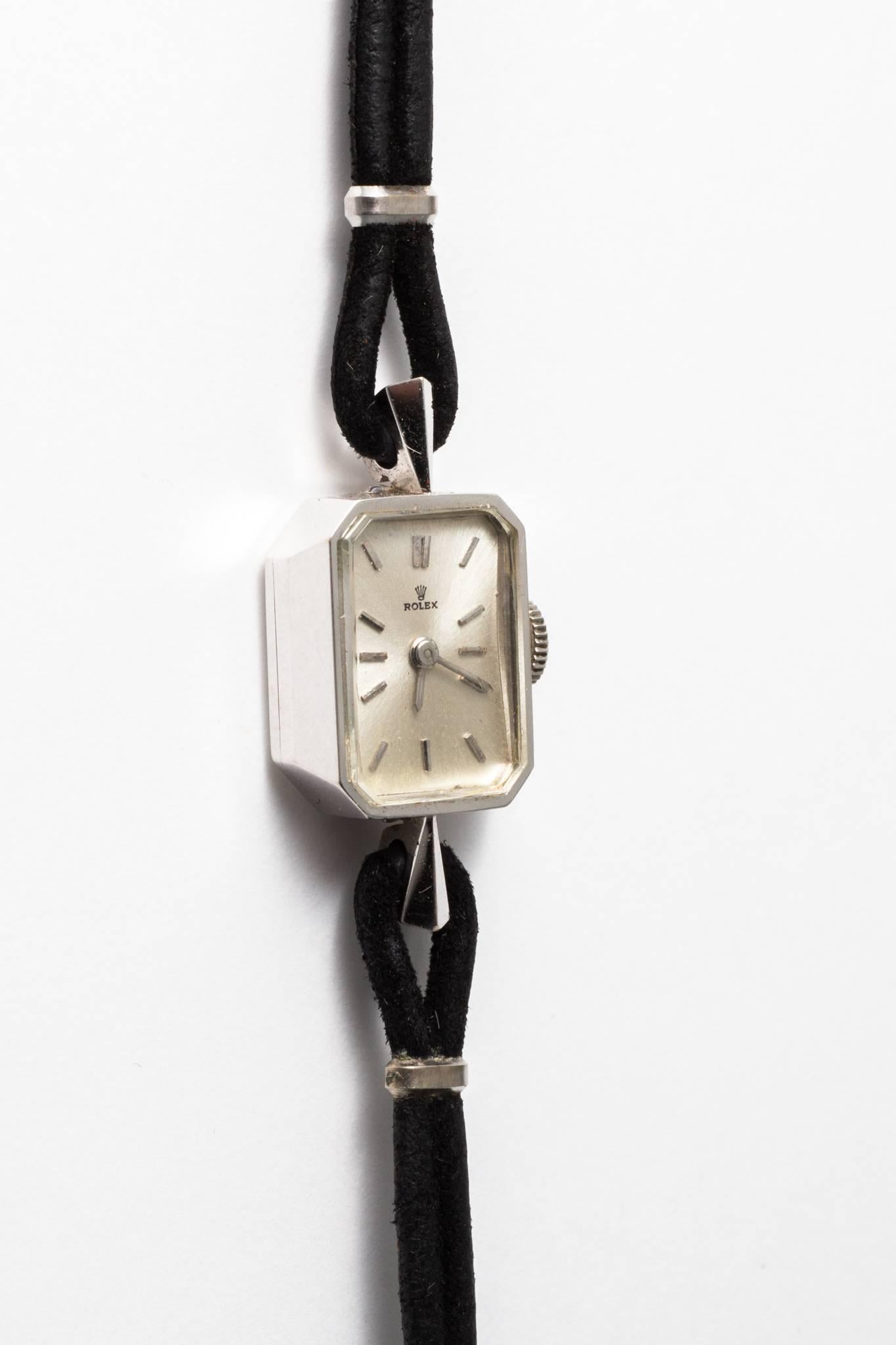 Beacon Hill Jewelers Presents:

A vintage, 1960's ladies Rolex wrist watch in 14 karat white gold.  In like new condition, this watch comes complete with it's rare original box.  

Featuring a silver dial and white gold case, this chic vintage rolex