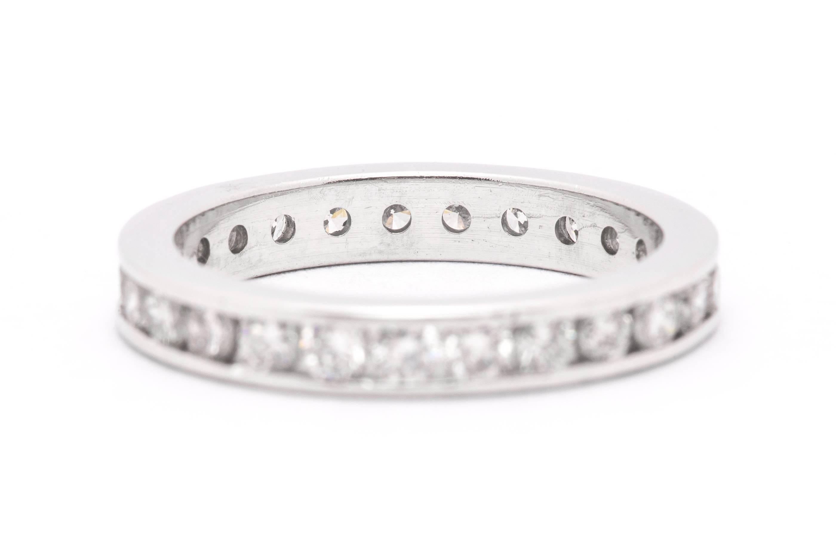 A one carat total weight diamond eternity band in luxurious platinum.  Set with a total of twenty five brilliant cut diamonds this band would complement any white gold, or platinum engagement ring perfectly.

Grading as VS clarity and G color, the