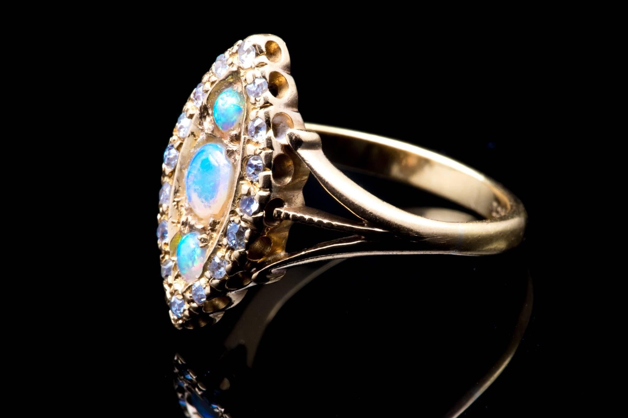 Opal and Diamond Trilogy Ring in 18 Karat Yellow Gold In Excellent Condition For Sale In Boston, MA