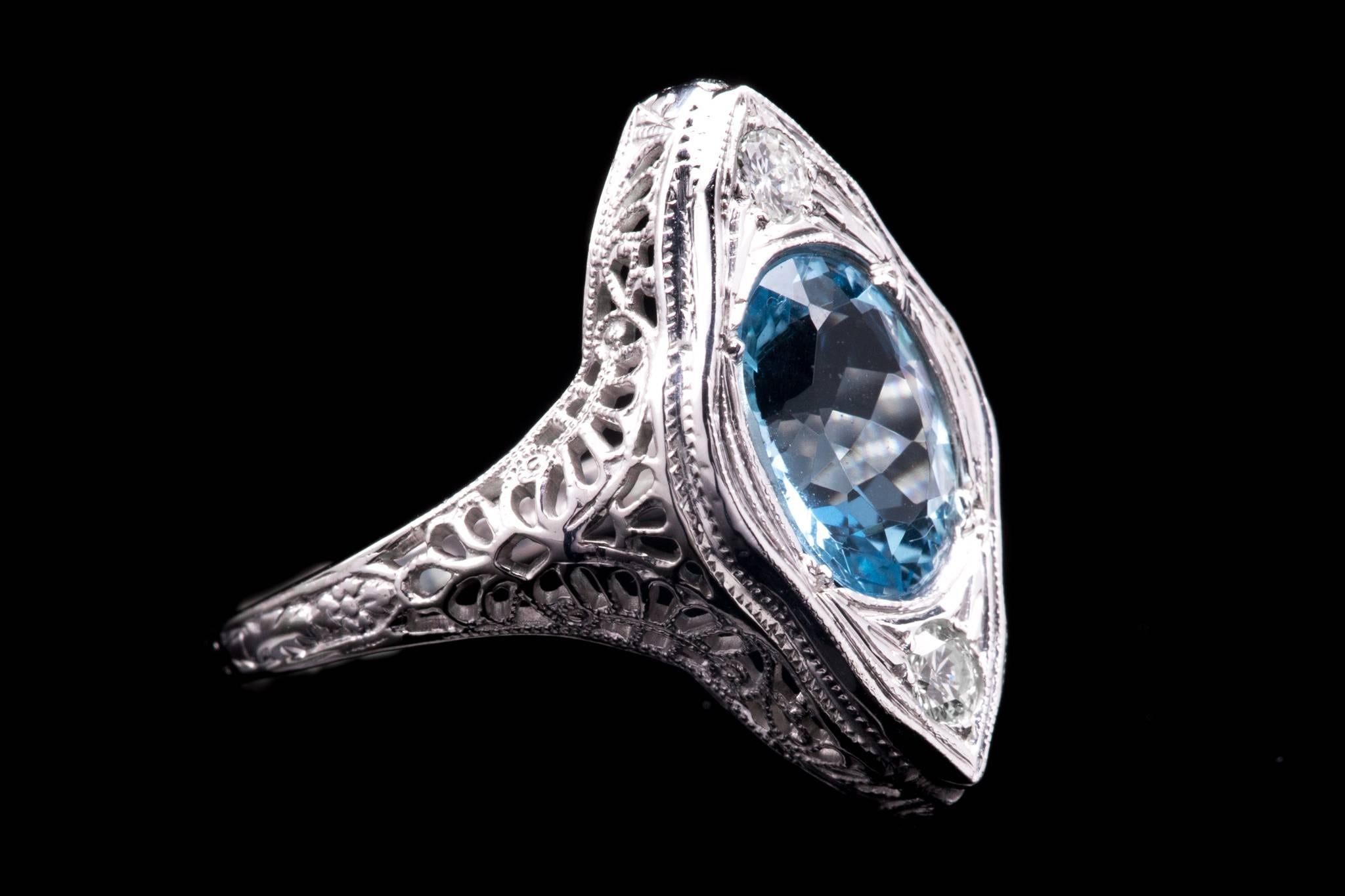 Art Deco Aquamarine and Diamond Filigree Ring in 18 Karat White Gold In Excellent Condition For Sale In Boston, MA