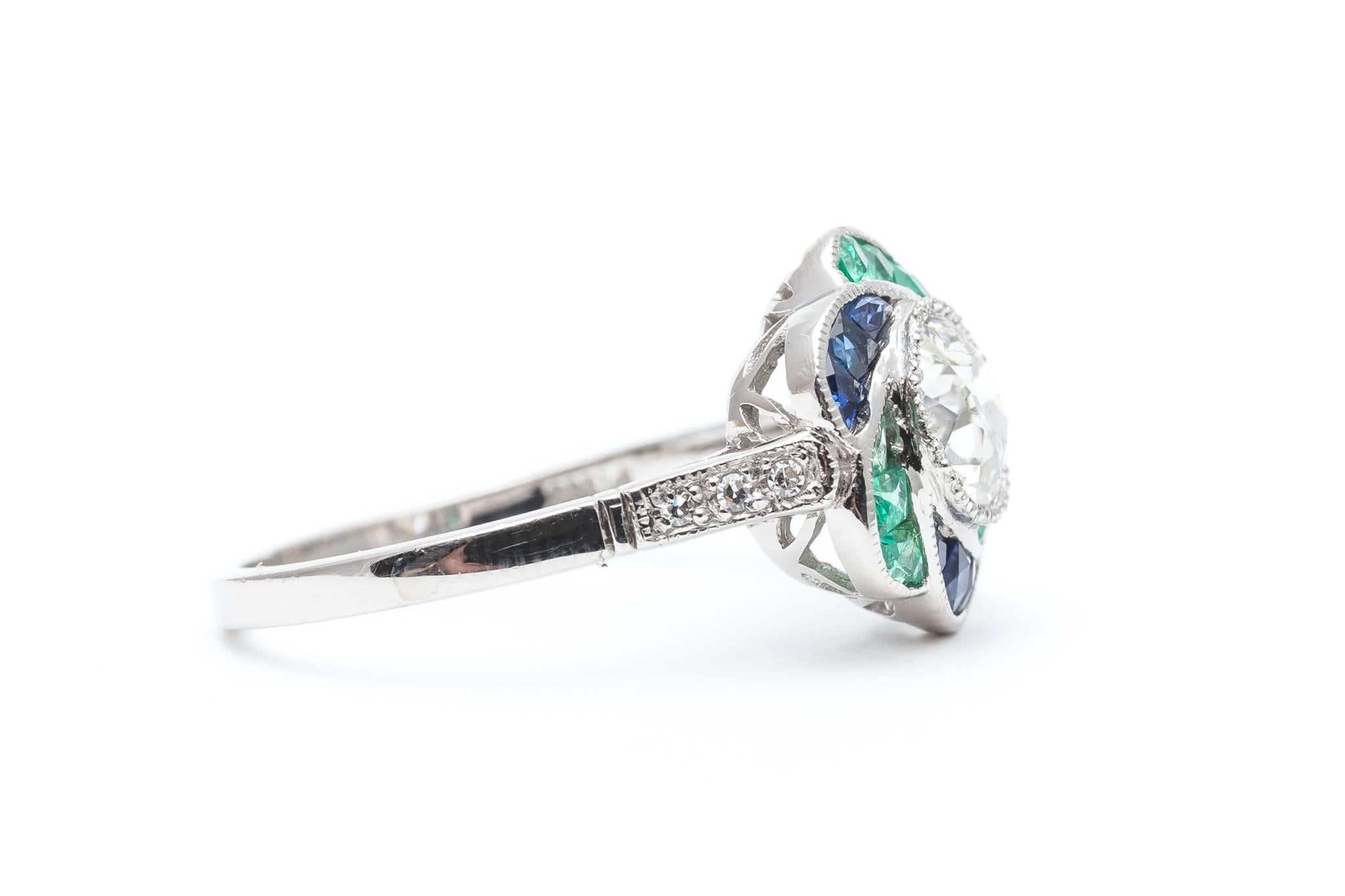 Blossoming Diamond, Emerald, and Sapphire Flower Engagement Ring For Sale 1