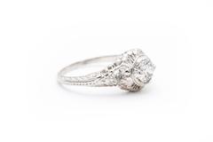 Floral and Heart Motif Diamond Platinum Filigree Engagement Ring