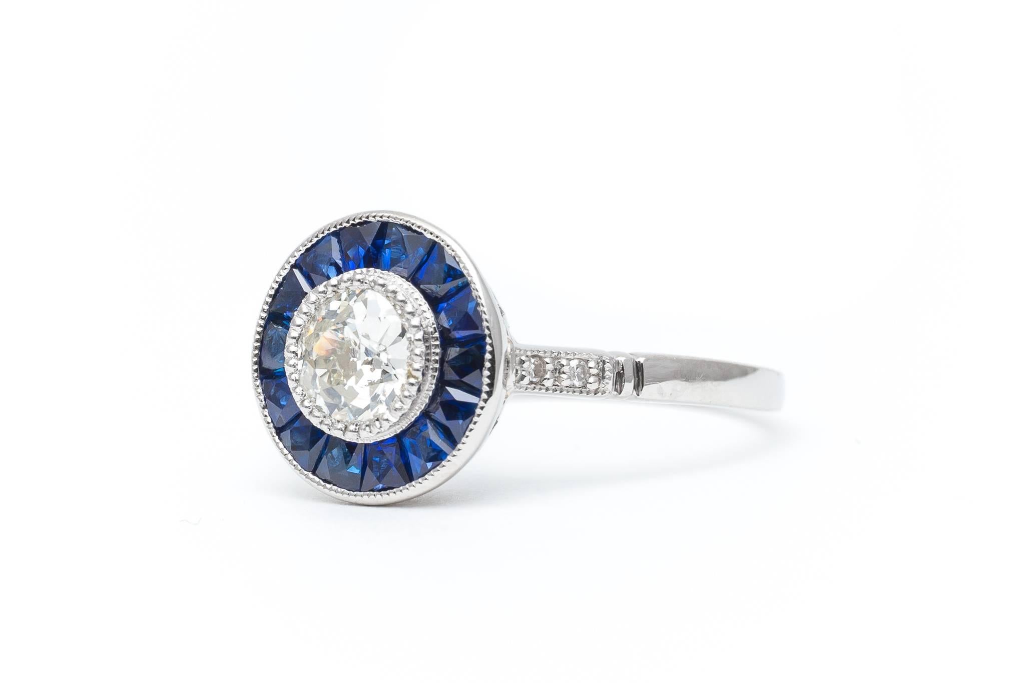 Vivid Blue French Cut Sapphire and Diamond Target Ring in Platinum In Excellent Condition For Sale In Boston, MA