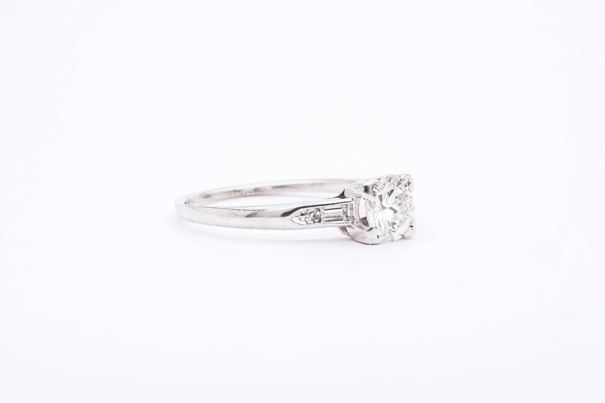 Art Deco Sleek 0.77 Carat Diamond Platinum Engagement Ring 