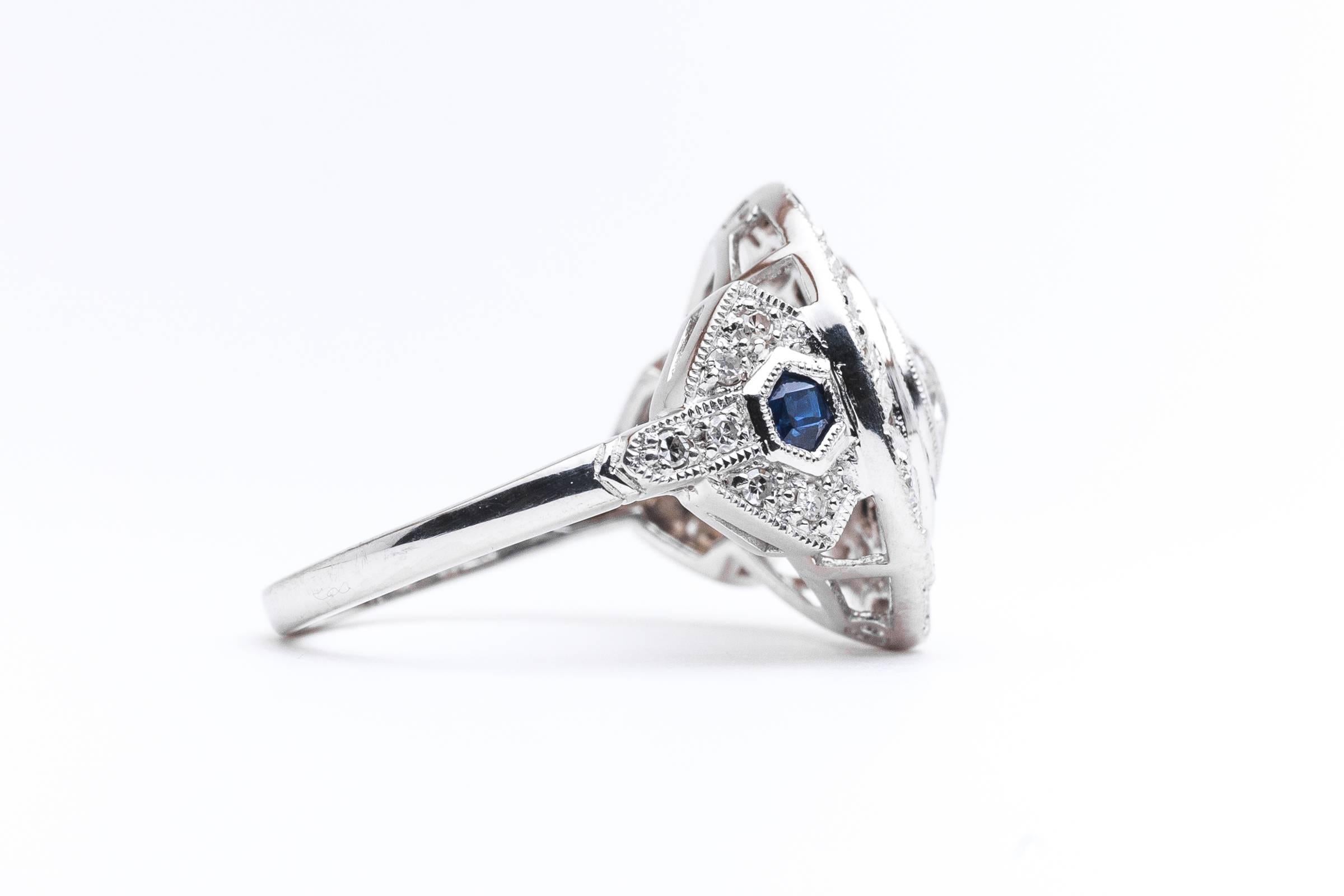 Dramatic 0.83 Carat Diamond and Sapphire platinum Target Ring In Excellent Condition For Sale In Boston, MA