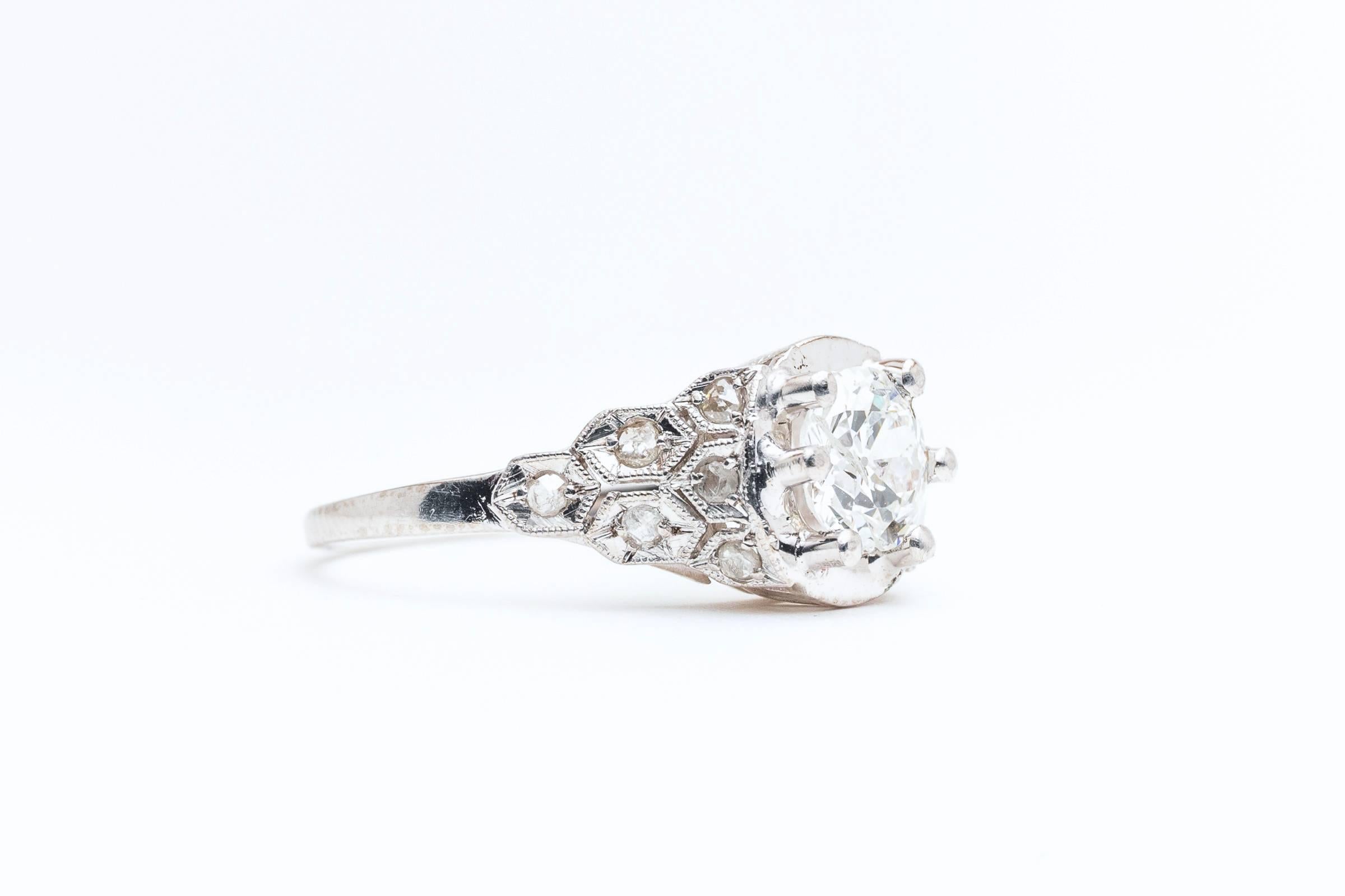 Beacon Hill Jewelers Presents:

A beautiful art deco period diamond engagement ring in luxurious platinum. Centered by a 1.15 carat old European cut diamonds of gorgeous D/E colorless color, this ring features accenting rose cut diamonds.

Of