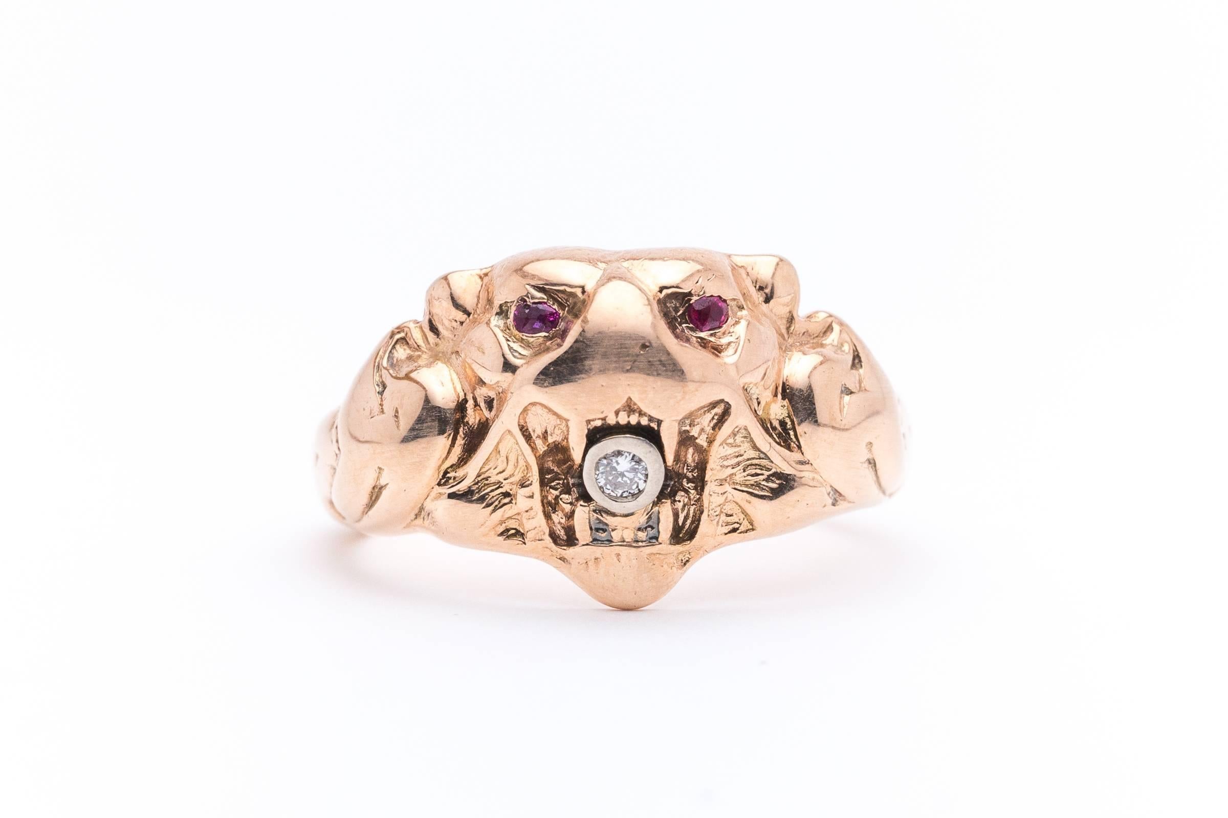 
Beacon Hill Jewelers Presents:

An antique hand crafted carved mens lion ring in 14 karat rose gold. Intense in it's appearance, the lion features a diamond mouth and piercing ruby eyes which add to the intensity of the piece.

Beautifully