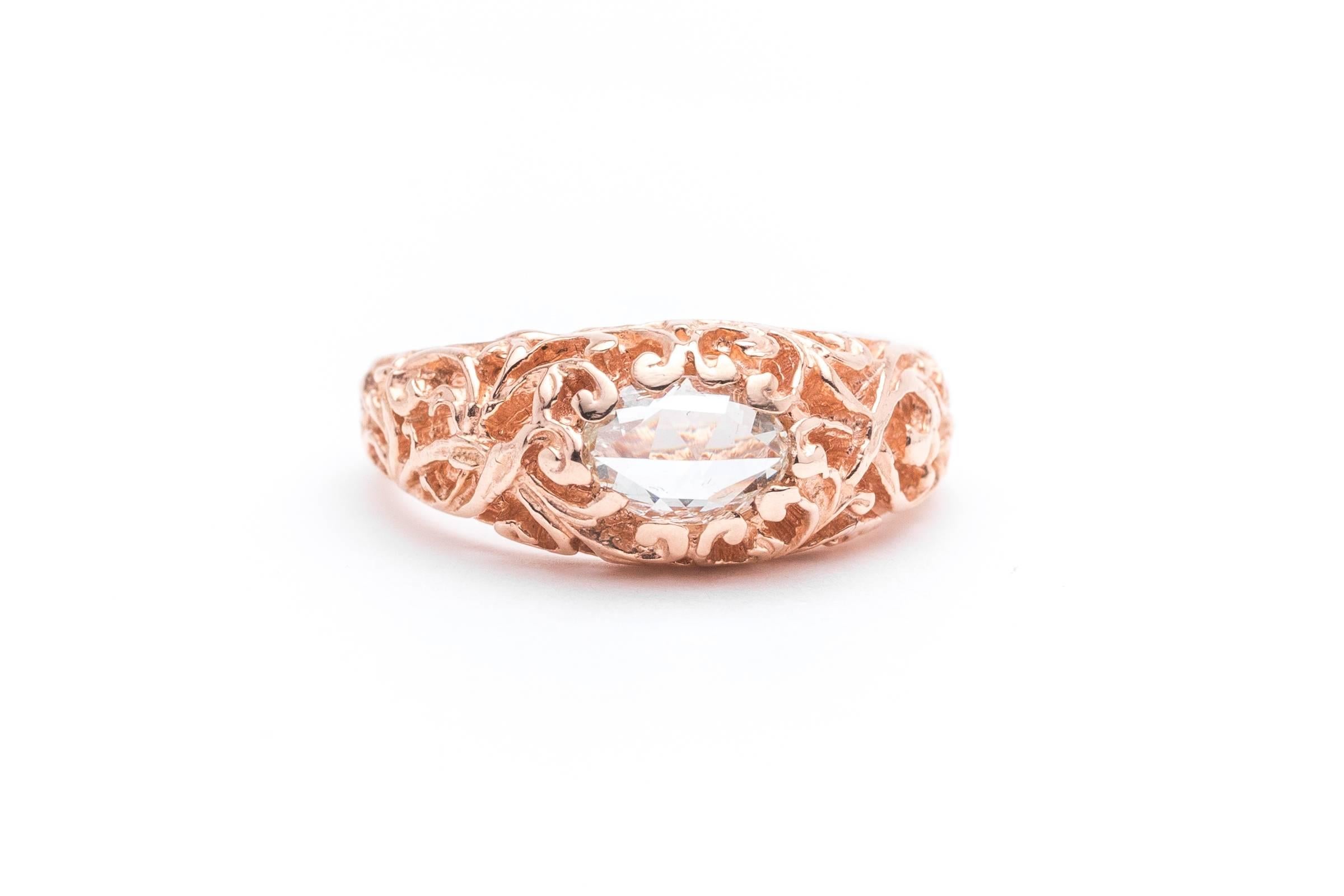 Beacon Hill Jewelers Presents:

A glorious handmade Georgian style rose cut diamond ring in rich 14 karat rose gold. Centered by an elongated rose cut diamond set east to west, this ring features a fantastic hand carved scroll motif