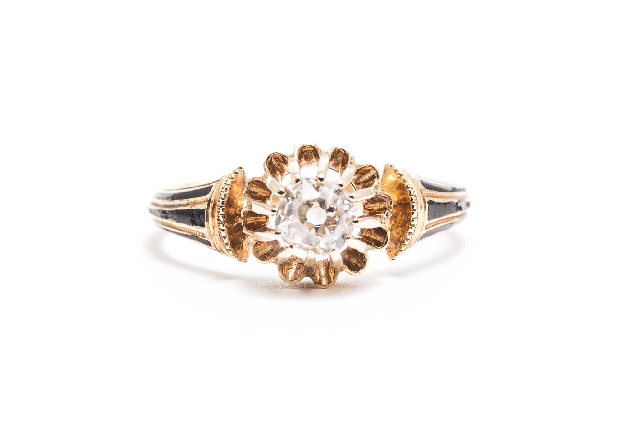 Beacon Hill Jewelers Presents:

An original early 19th century Georgian period enameled engagement ring in 18 karat yellow gold. Centered by an approximately 0.35 carat old Mine cut diamond this ring features vertical black enameling and a