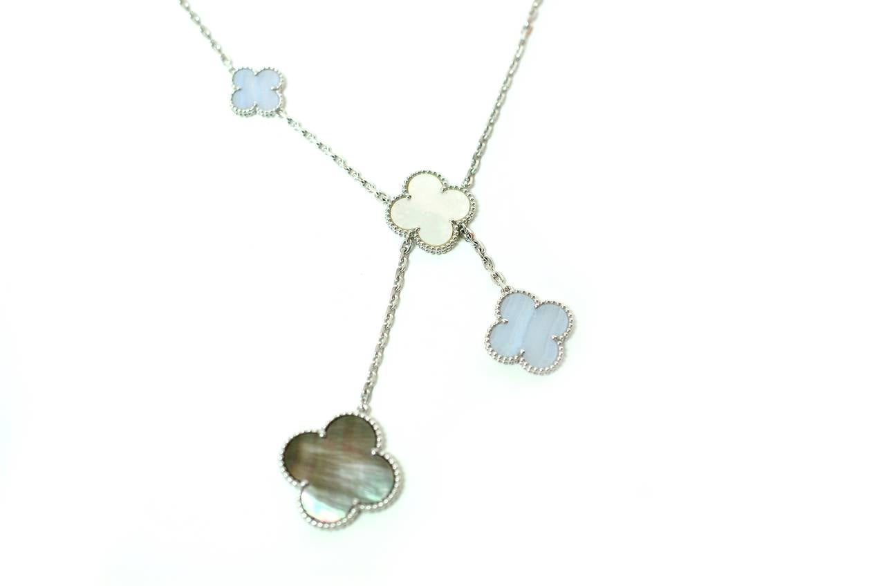 Brand: Van Cleef & Arpels
Style: Magic Alhambra
Motifs: 6
Stone: Mother of Pearl &  Chalcedony 
Metal: White Gold 
Length: 17