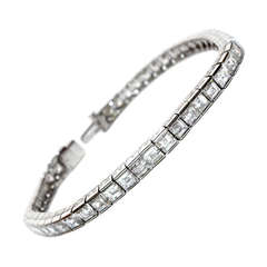 Art Deco Carre Cut Diamond 10.00ct F-VS1 Platinum Line Tennis Bracelet.