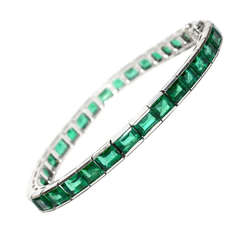 Art Deco Emerald Platinum Art Deco Line Tennis Bracelet  20.00ct .