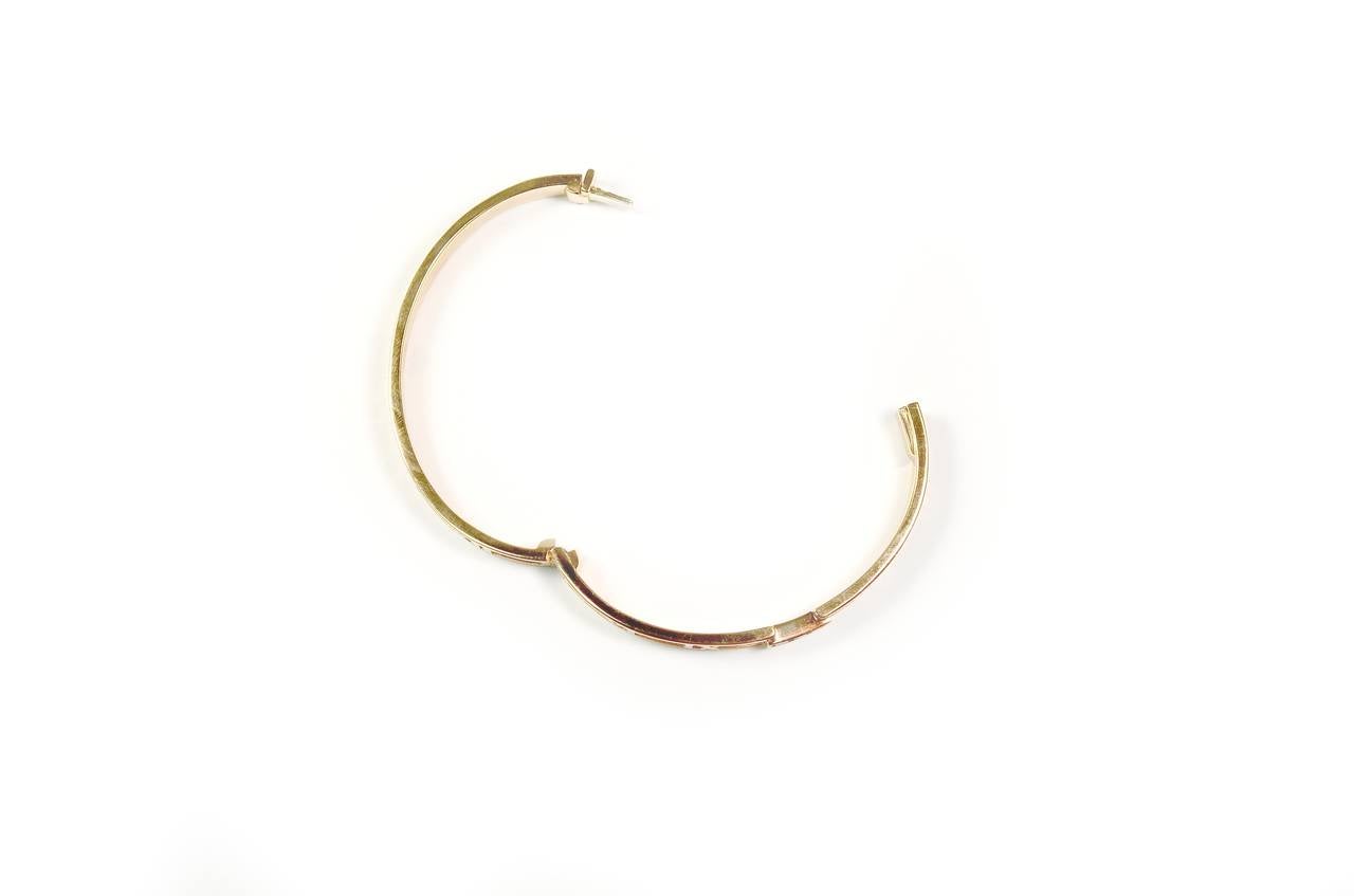 Brand: Tiffany & Co

Model:  Atlas Hinged Bangle

Metal: 18k  Rose Gold 

Stones: Diamonds

Size : 6.25