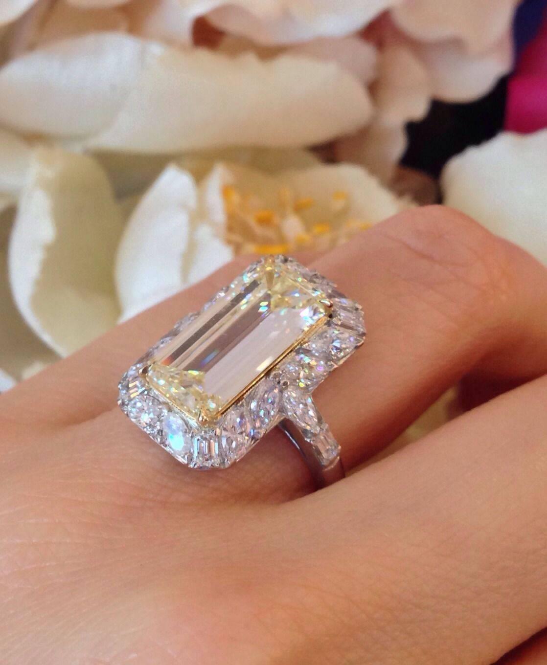 Women's GIA 4.41 Carat Emerald Cut Fancy Light Yellow Diamond Gold Platinum Halo Ring
