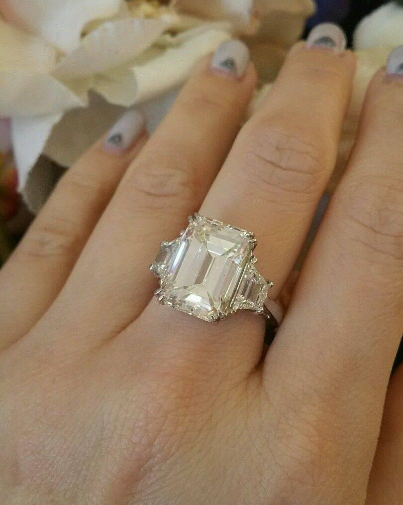 GIA Certified 10.02 ct Center Emerald cut Three-stone Diamond Engagement Ring in Platinum

Center Diamond: 
Emerald cut Diamond : 10.02 carat
dimension: 14.59 x 10.38 x 7.22 mm
Color Grade: S to T Range
Clarity Grade: