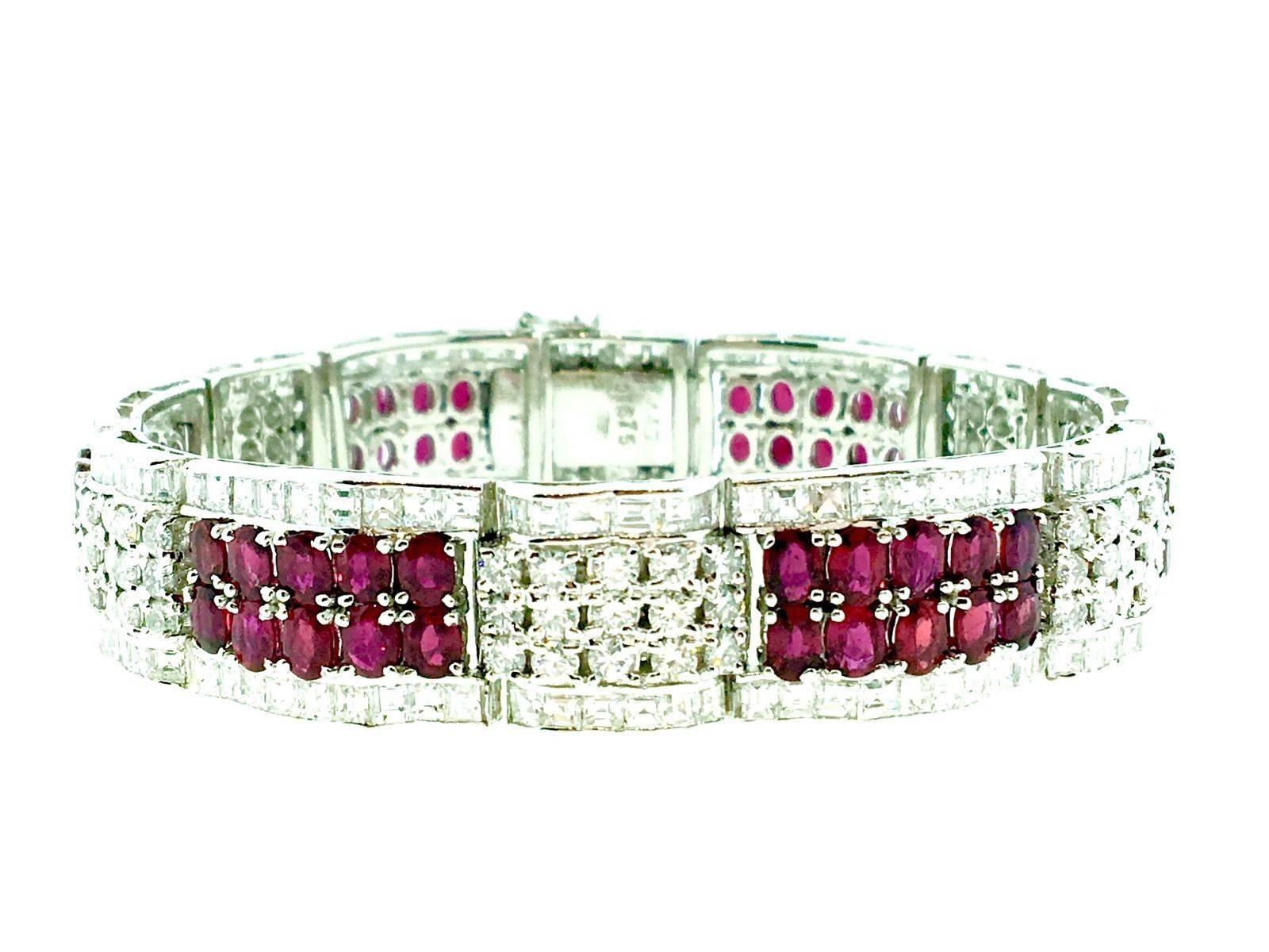 Platinum Ruby and diamond statement bracelet featuring 60 Oval Rubies with rich, deep red color, totaling 14.45 cts and 60 square cut diamonds,
90 round brilliant cut diamonds, VS2 clarity, H color, totaling 16.75 cts. 
Total Stone weight is 31.20