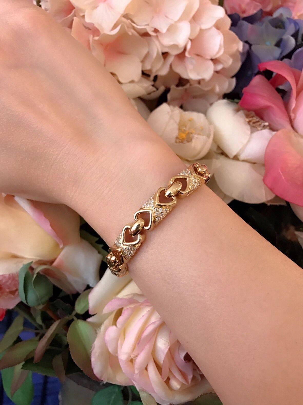 Bracelet features 4.45 cts of round brilliant cut pave-set diamonds. Diamond quality is averaging G color and VS clarity.  Flexible link bracelet made in high polished 18K yellow gold.  Hallmarks: H 750 4.45.  Bracelet weighs 33.0 grams 