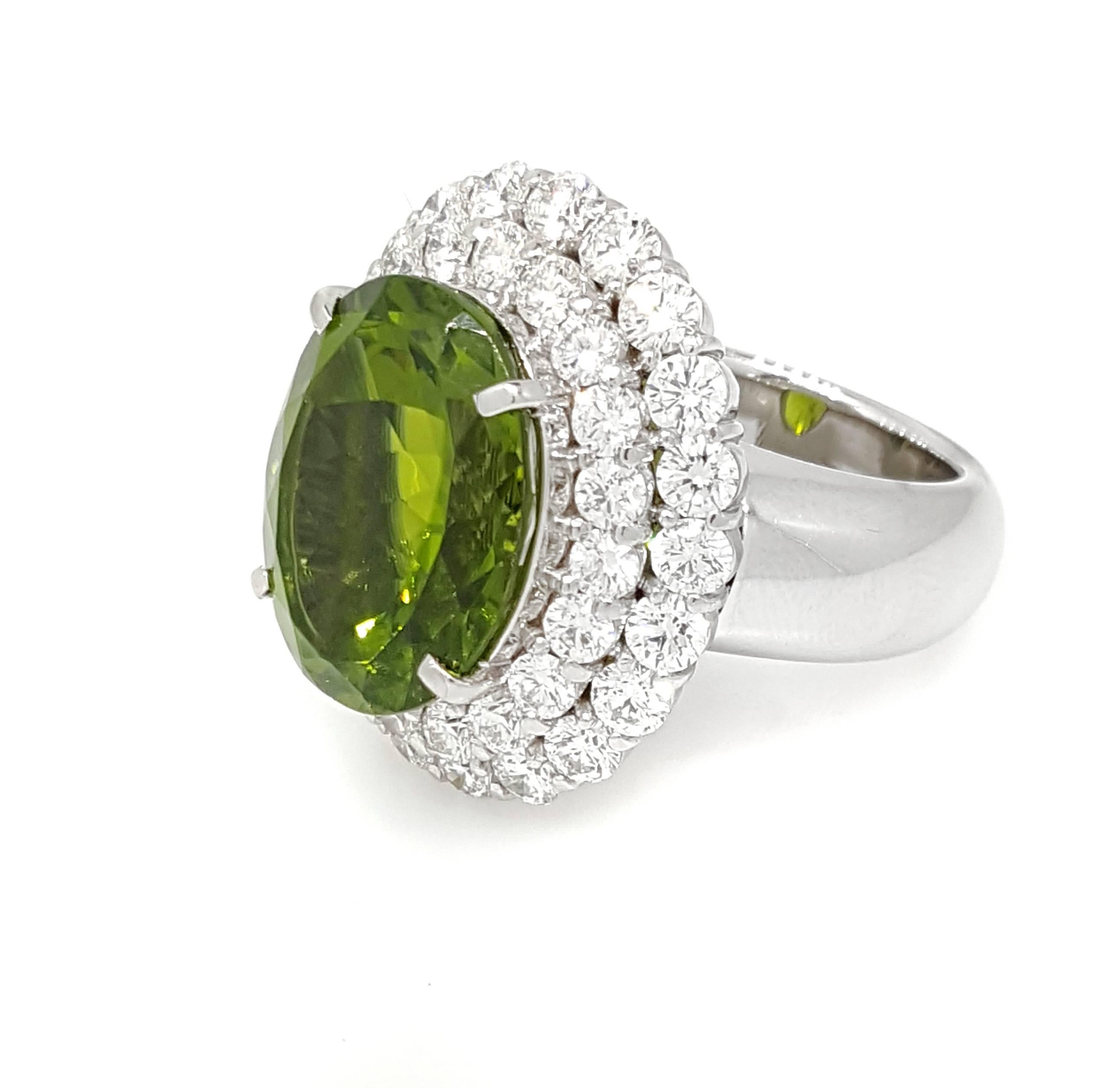 Large Oval Peridot Diamond Platinum Halo Ring In Excellent Condition For Sale In La Jolla, CA