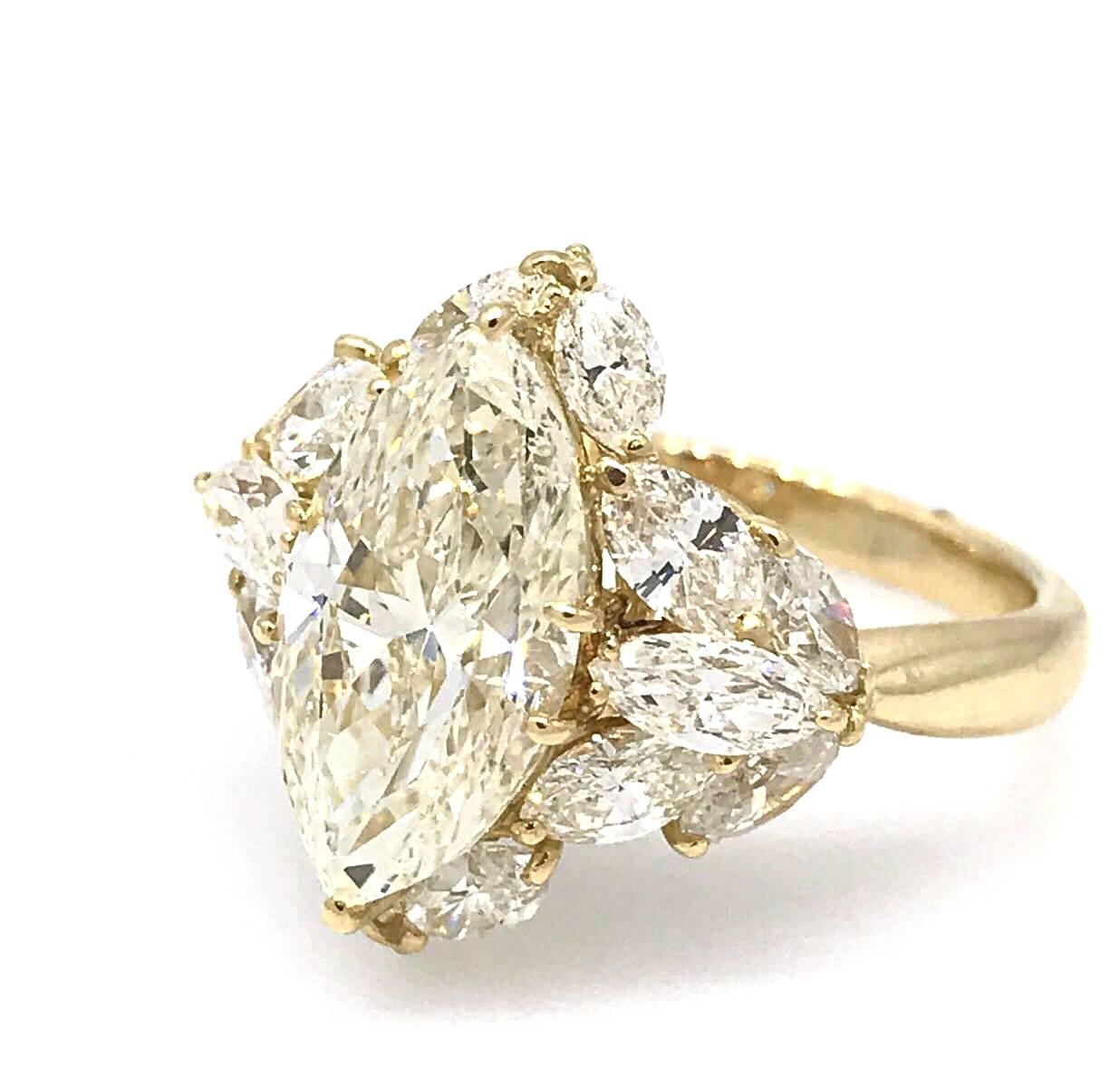 Marquise Cut 3.06 Carat Marquise Diamond Ring with Marquise Side Diamonds in Yellow Gold For Sale