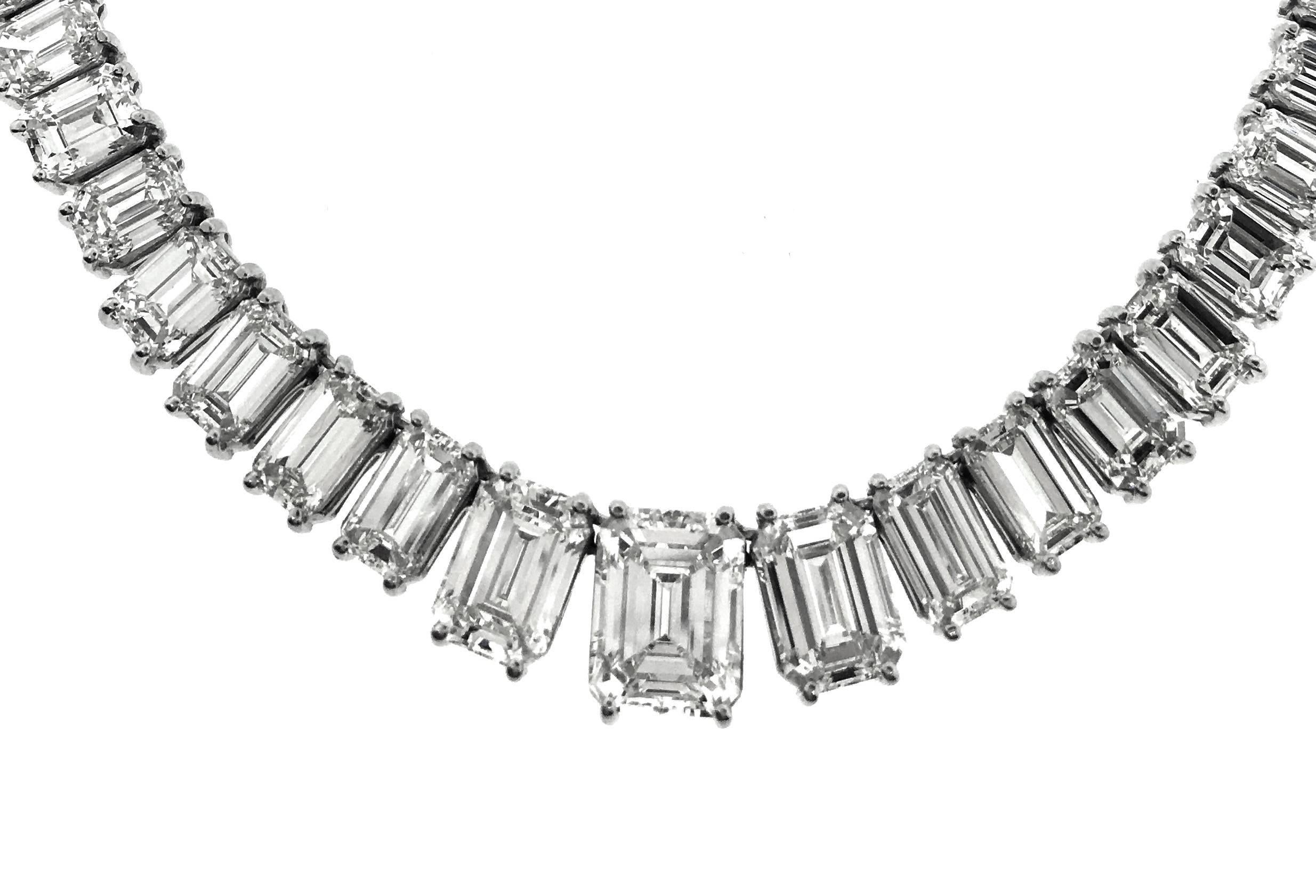 Diamond riviera necklace features 108 graduated Emerald cut diamonds with each diamond individually prong set by hand. 66.69 carats total in diamond weight. High quality diamonds, estimated K-L in color and VS in clarity.
19.5 inches Platinum