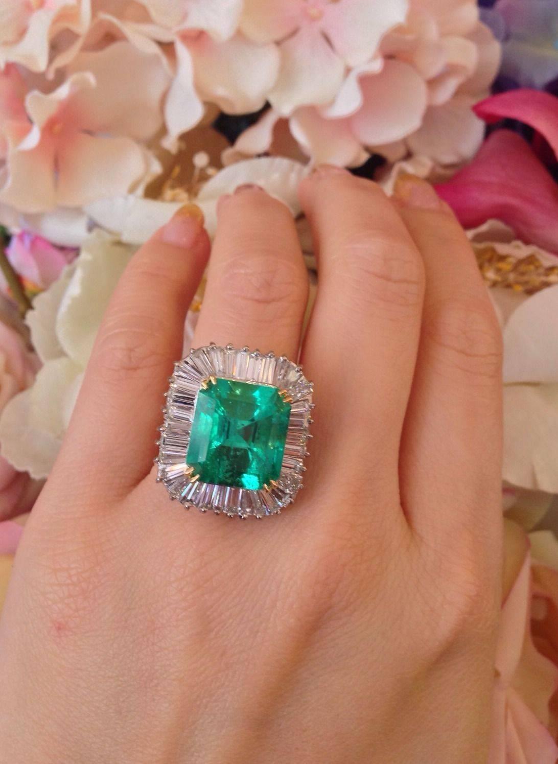 Natural Colombian Emerald ballerina ring featuring a medium to light green, 
Emerald cut Emerald weighing 10.80 ct . GIA Certified (*see photo in the gallery) Stone measurements: 12.75 x 13.95 mm (measured in setting)

Emerald is set in a 