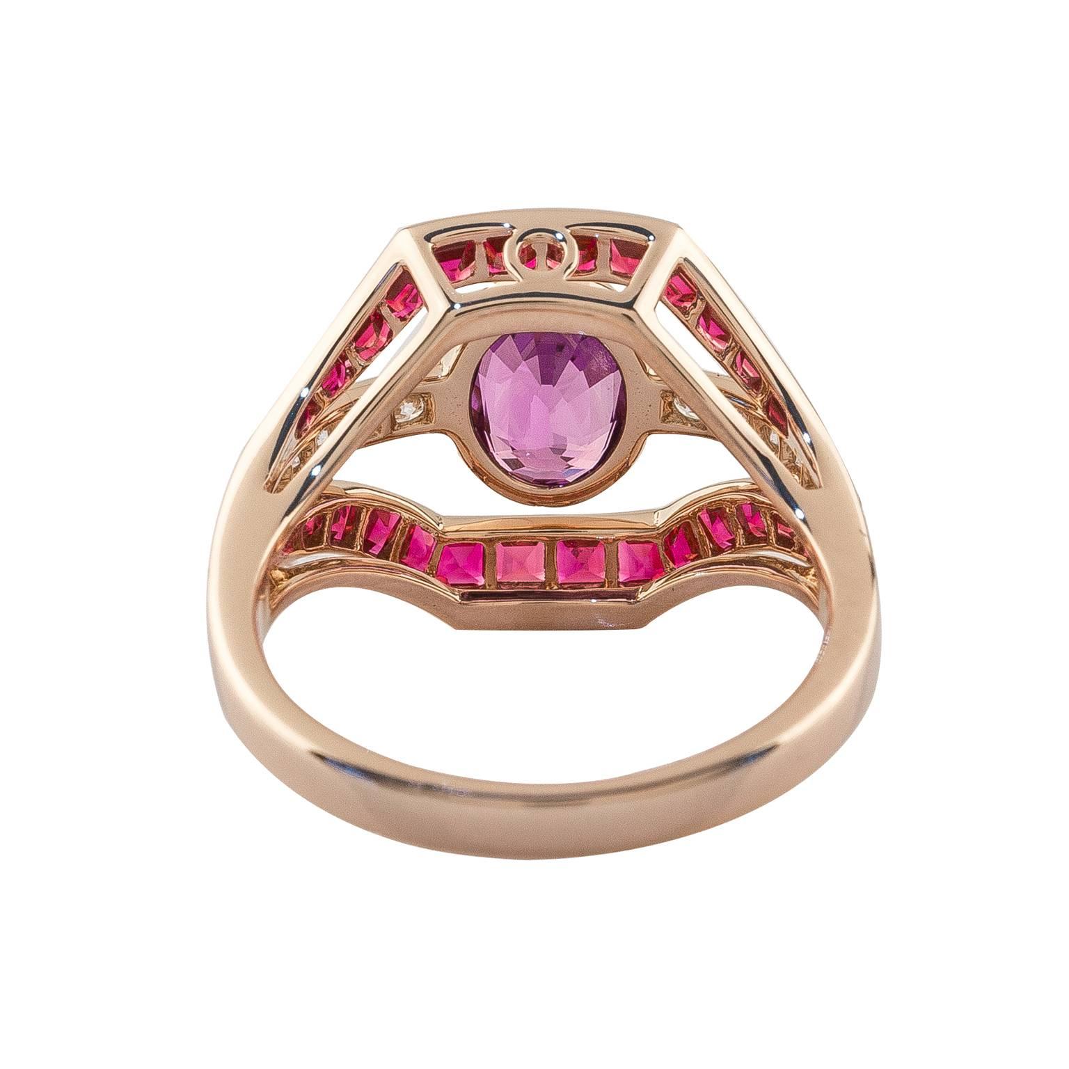 Art Deco style 18k rose gold ring centers around a magnificent 1.46ct purple oval sapphire. This show stopping cocktail ring is further accented withFine Burmese rubies of outstanding color and diamonds. Ring is sizable.

Size: 7
1.46ct Purple