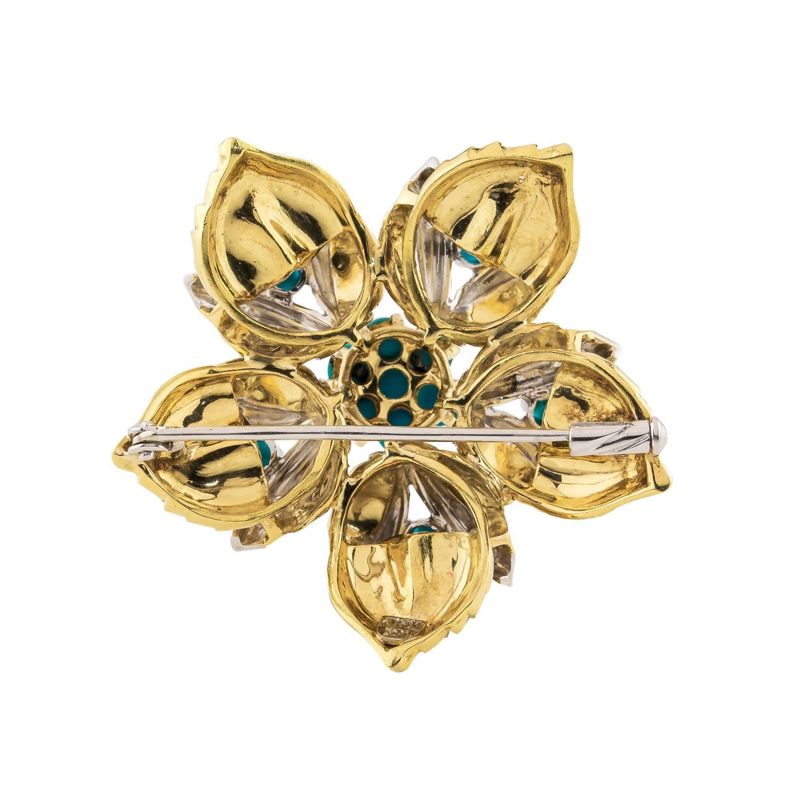 This lovely Mid-Century 18k yellow and white gold brooch features 12 turquoise cabochons and 0.06 cttw single cut diamonds set into a five petal flower motif. 
1.5 in dia. (3.81cm)
Marked Italy