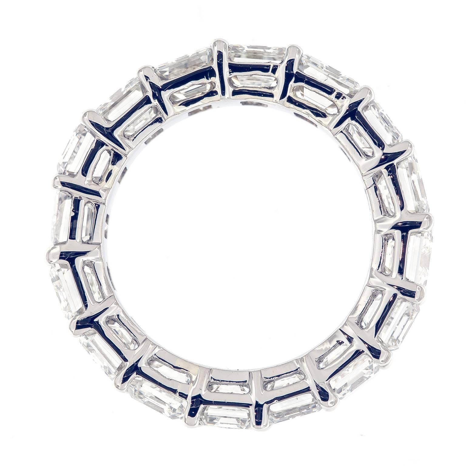 This exceptional diamond eternity ring showcases 16 emerald-cut diamonds set in beautiful platinum. An eternity band can either be worn by itself, or stacked with an engagement ring or wedding band. Ring size 5.5. 6 mm wide

Diamonds 12.35