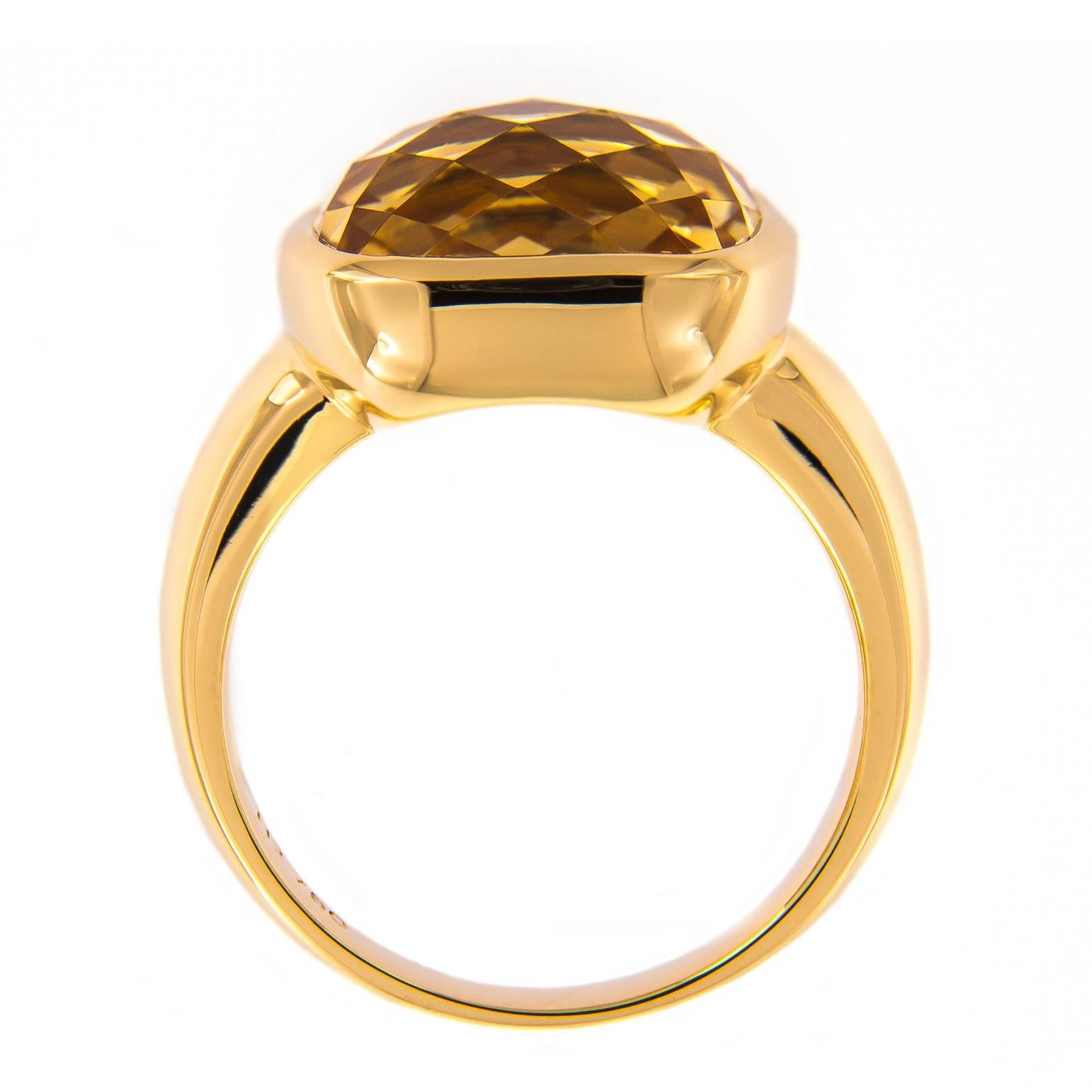 Make a statement with sunny yellow hues with this fashion ring from the H2 Collection by Hammerman of New York. This beautiful checkerboard cushion cut citrine is x set in 18k yellow gold.

Ring Size 6.25
Citrine 7.85 carat.