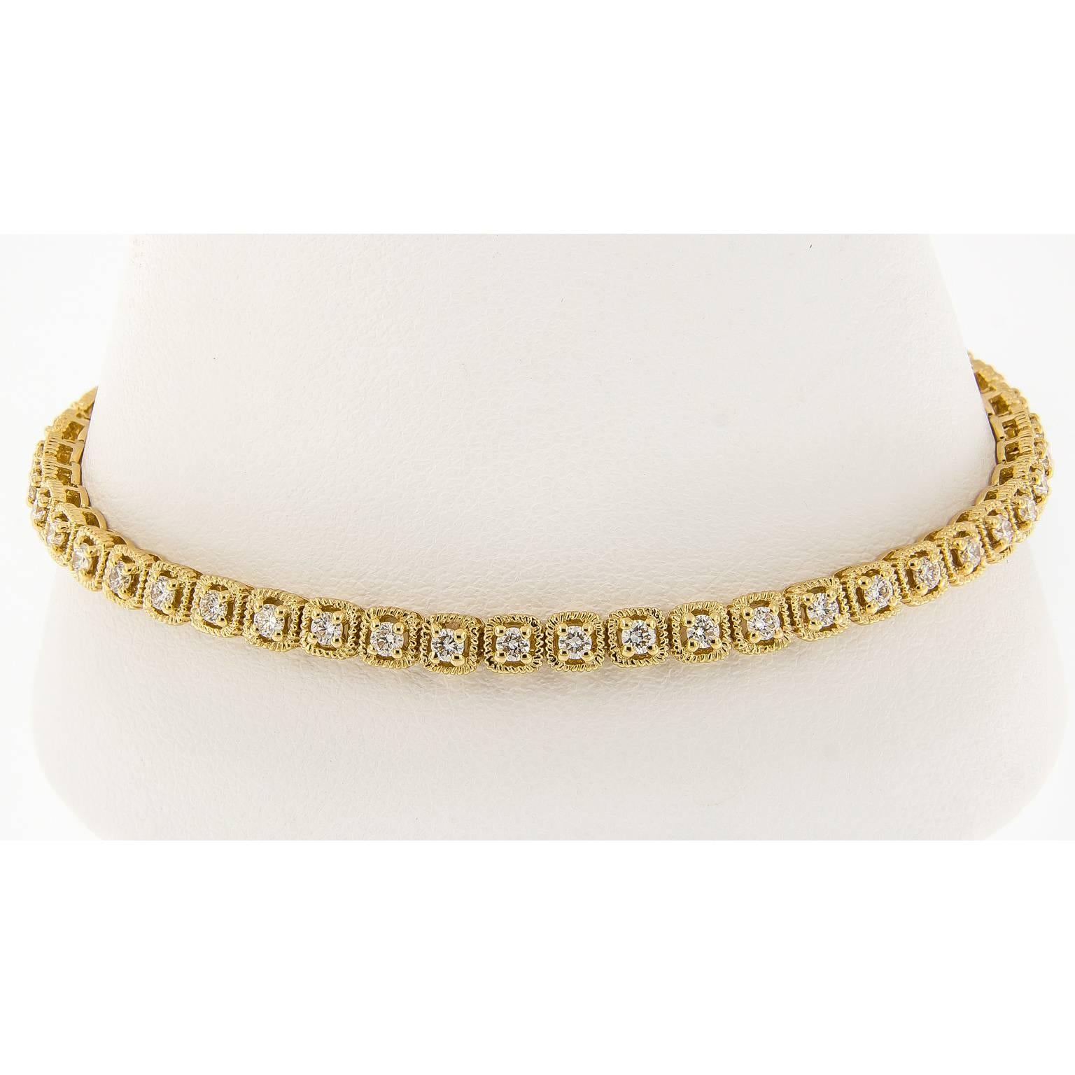This on-trend design brings a contemporary twist to the classic tennis bracelet. Bracelet is executed in 18k yellow gold and has a unique link design, accented with prong set diamonds. She can wear one, two or more bolo designs together to create a