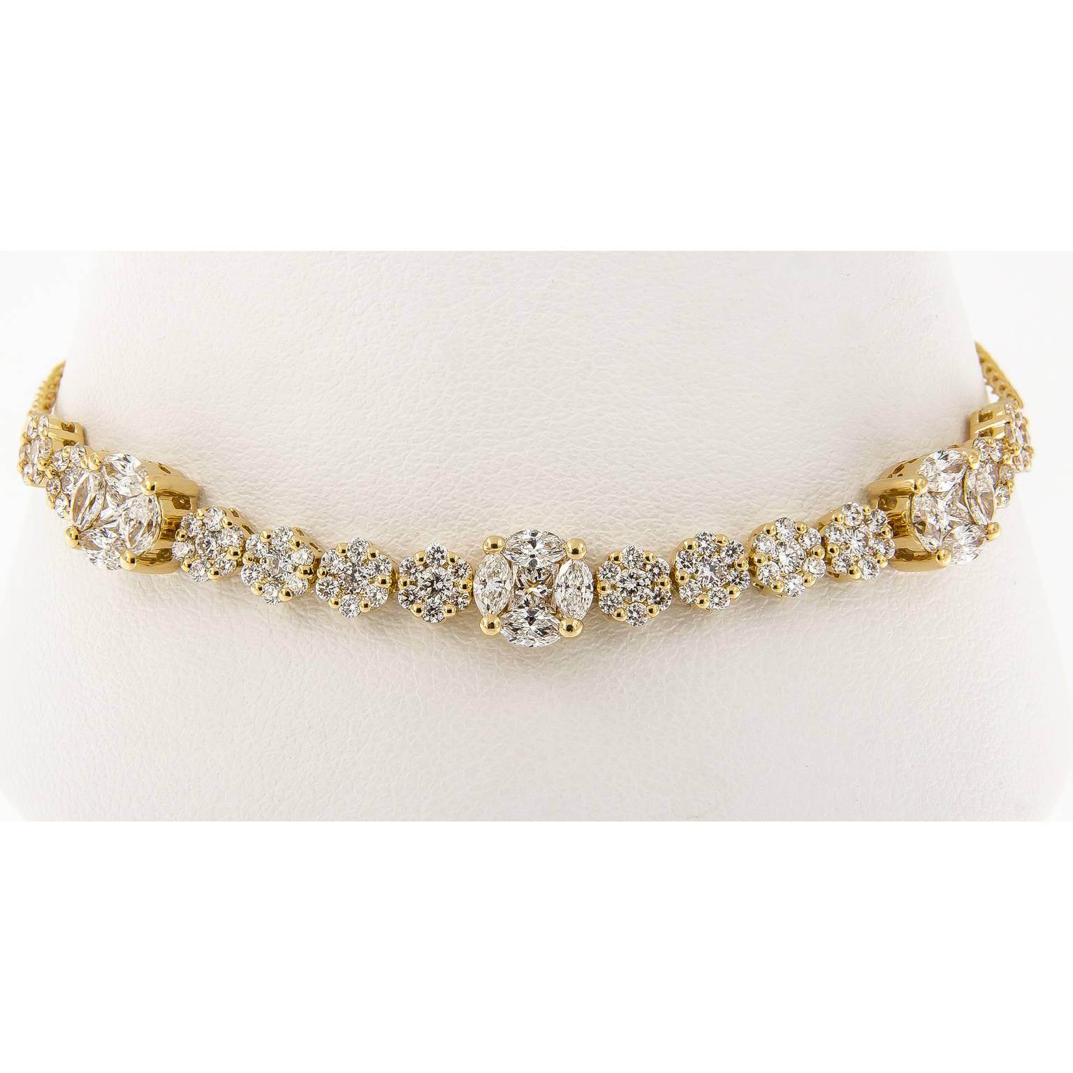 This on-trend design brings a contemporary twist to the classic tennis bracelet. Bracelet is executed in 18k yellow gold and features sparkling diamonds set in a floret design. She can wear one, two or more bolo designs together to create a look all