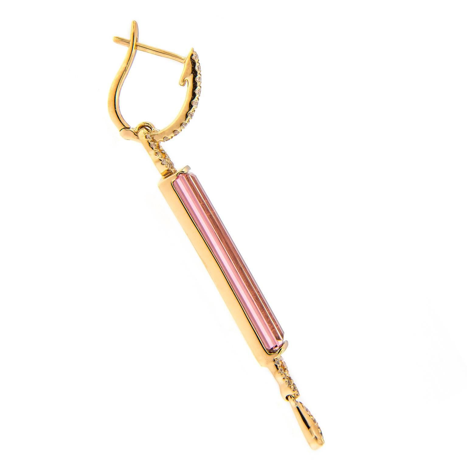 An exquisite choice she’ll adore, these elegant linear pink tourmaline and diamond drop earrings will accentuate her femininity. Crafted in 18k rose gold.
 2 in Long. 5mm wide.

Tourmaline 7.74 cttw
Diamonds 0.30 cttw