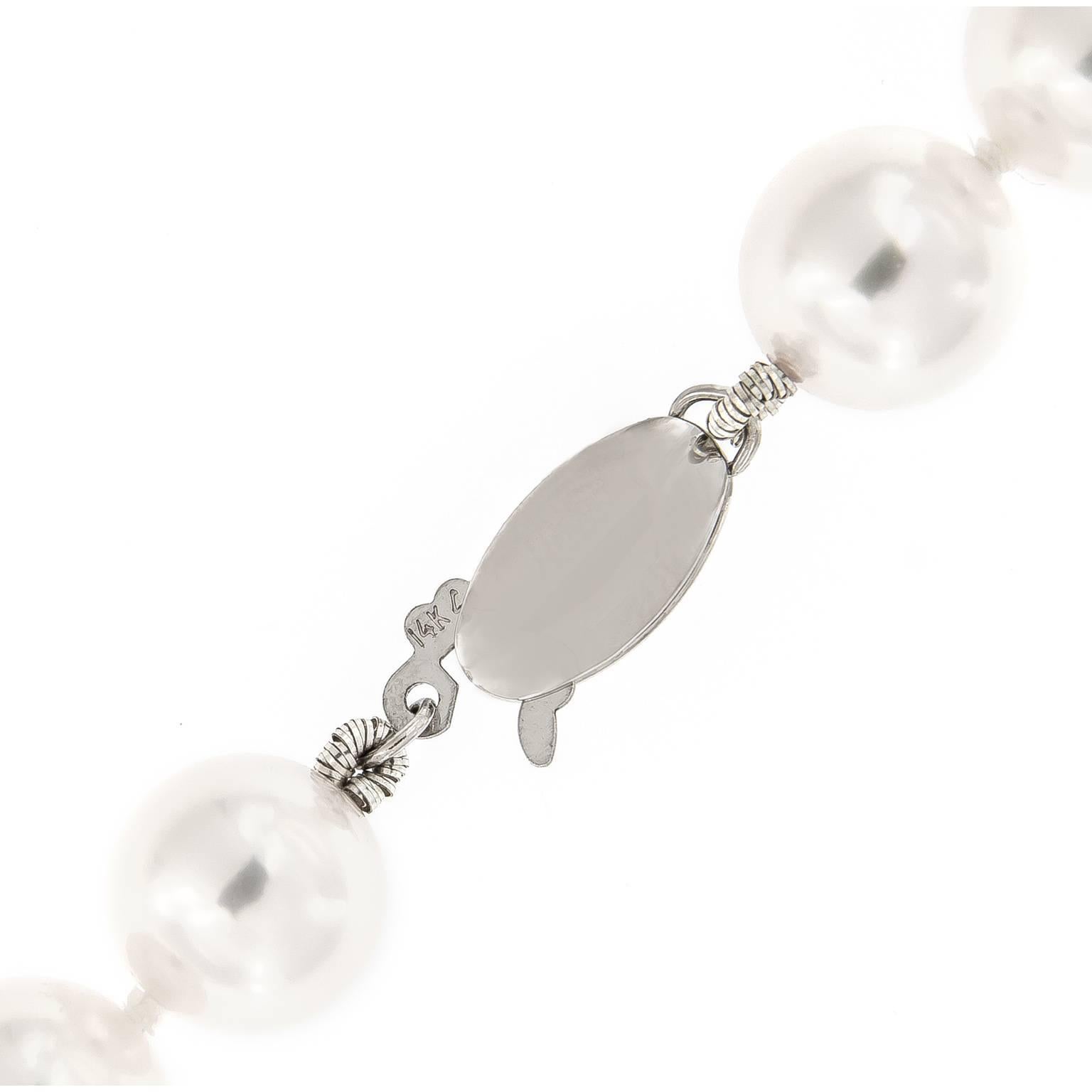 A pearl necklace is a gift of romance and is a sign of eternal love. This necklace features 48 8.5 mm-9 mm Akoya cultured pearls with a oval 14 white gold clasp. Akoya pearls are exquisite, classic pearls coming directly from Japan. They are known