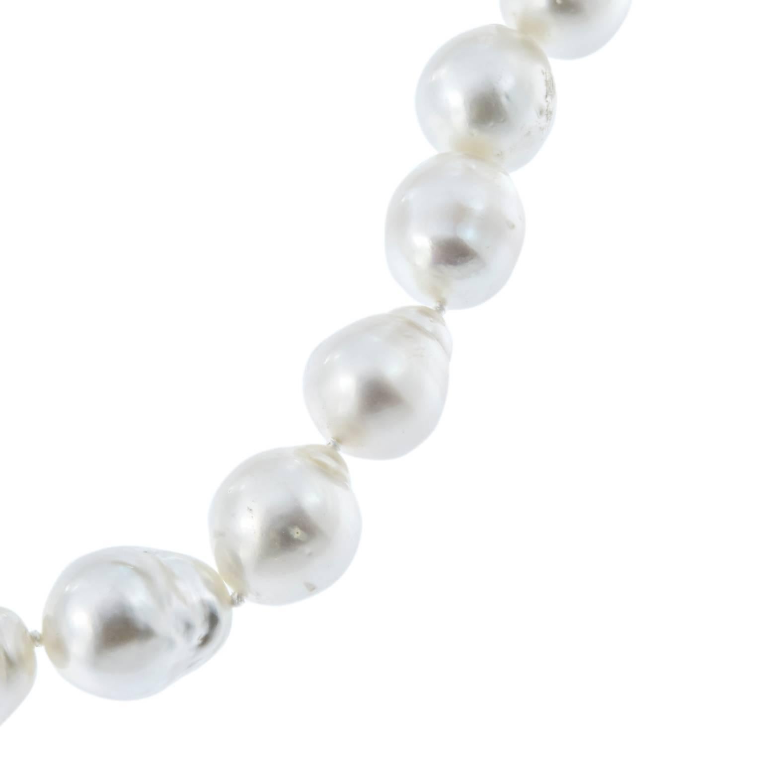 Stunning south sea baroque pearl necklace is comprised of 27 pearls, 12-16 mm. Clasp is 18k white gold. Weighs 89.9 grams. 17 in Long.