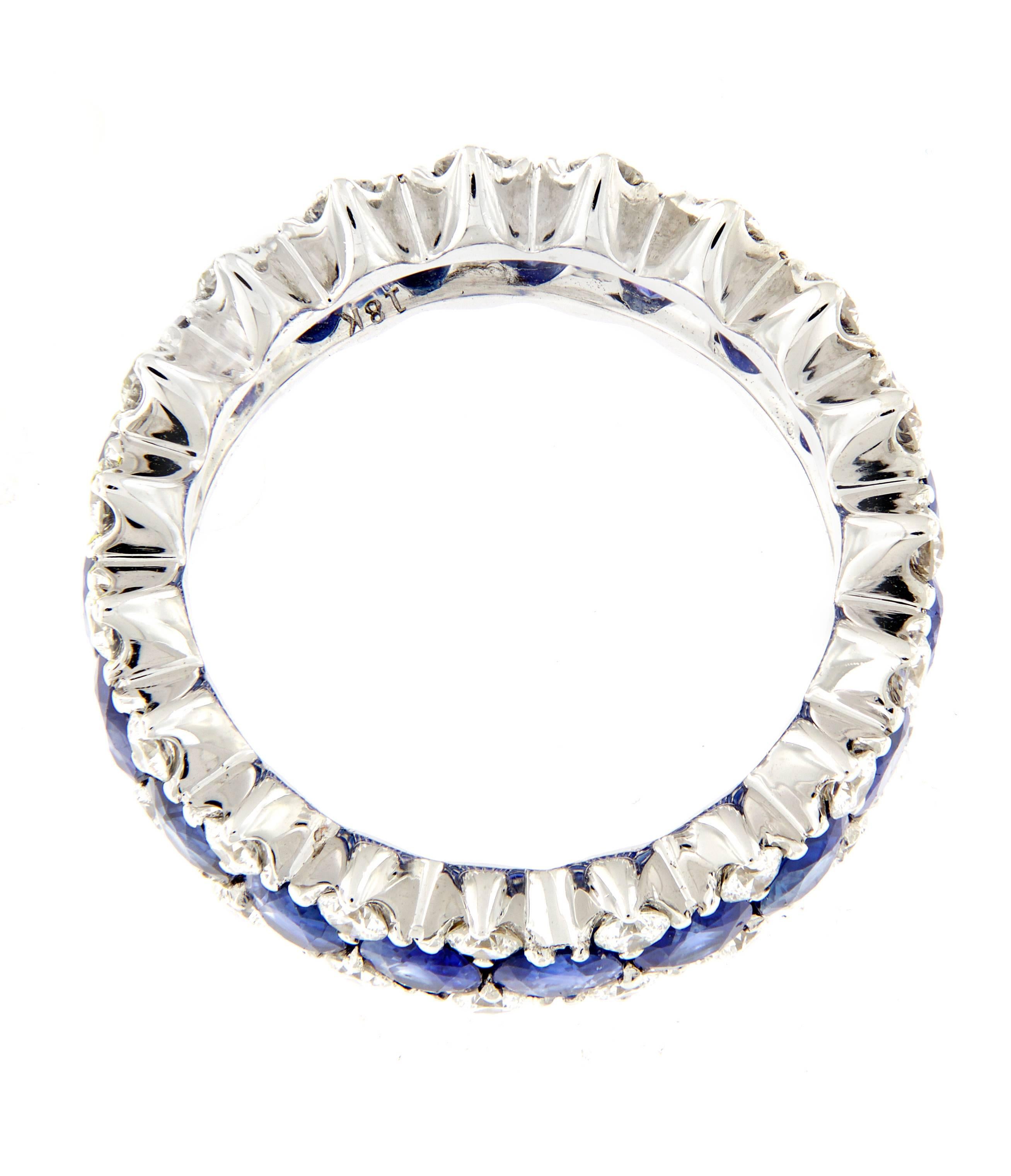 A beautiful combination of oval sapphires and diamonds create a stunning eternity ring. Weighs 7.7 grams. Ring Size 7.5.

Sapphire 6.41 cttw
Diamond 1.36 cttw