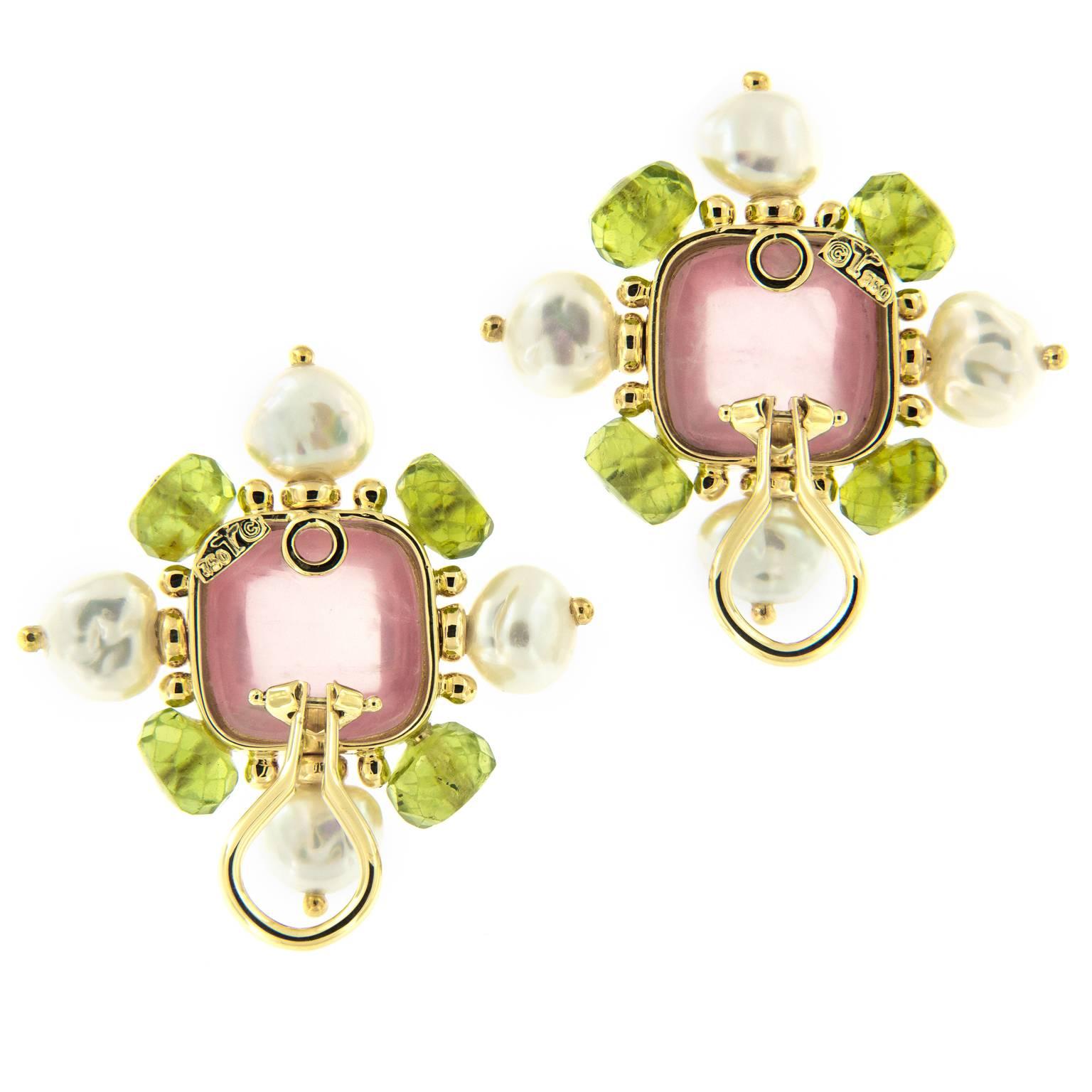 Creating original jewels with unusual combinations of precious and exotic materials has been the hallmark of Trianon jewelry. These beautiful earrings are comprised of a rose quartz center cabachon with 8-6 mm faceted peridots and pearls set in 18k