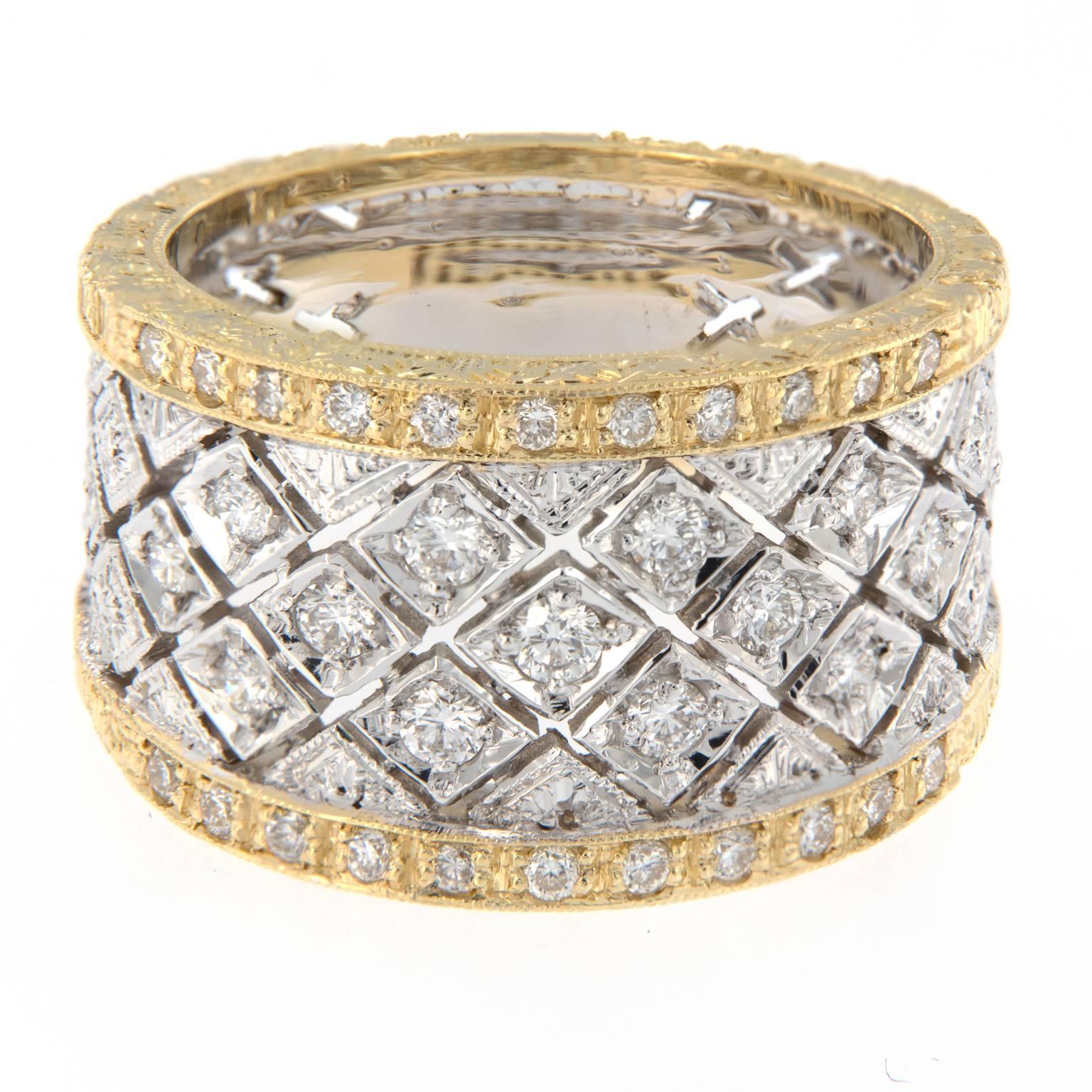 Beautiful 18k white and yellow gold band ring with an open work criss cross pattern with diamonds. The yellow gold border is an engraved brush finish with diamonds. Weighs 9.5 grams. Ring size 7.5.

Diamonds 0.59 cttw
Marked Italy