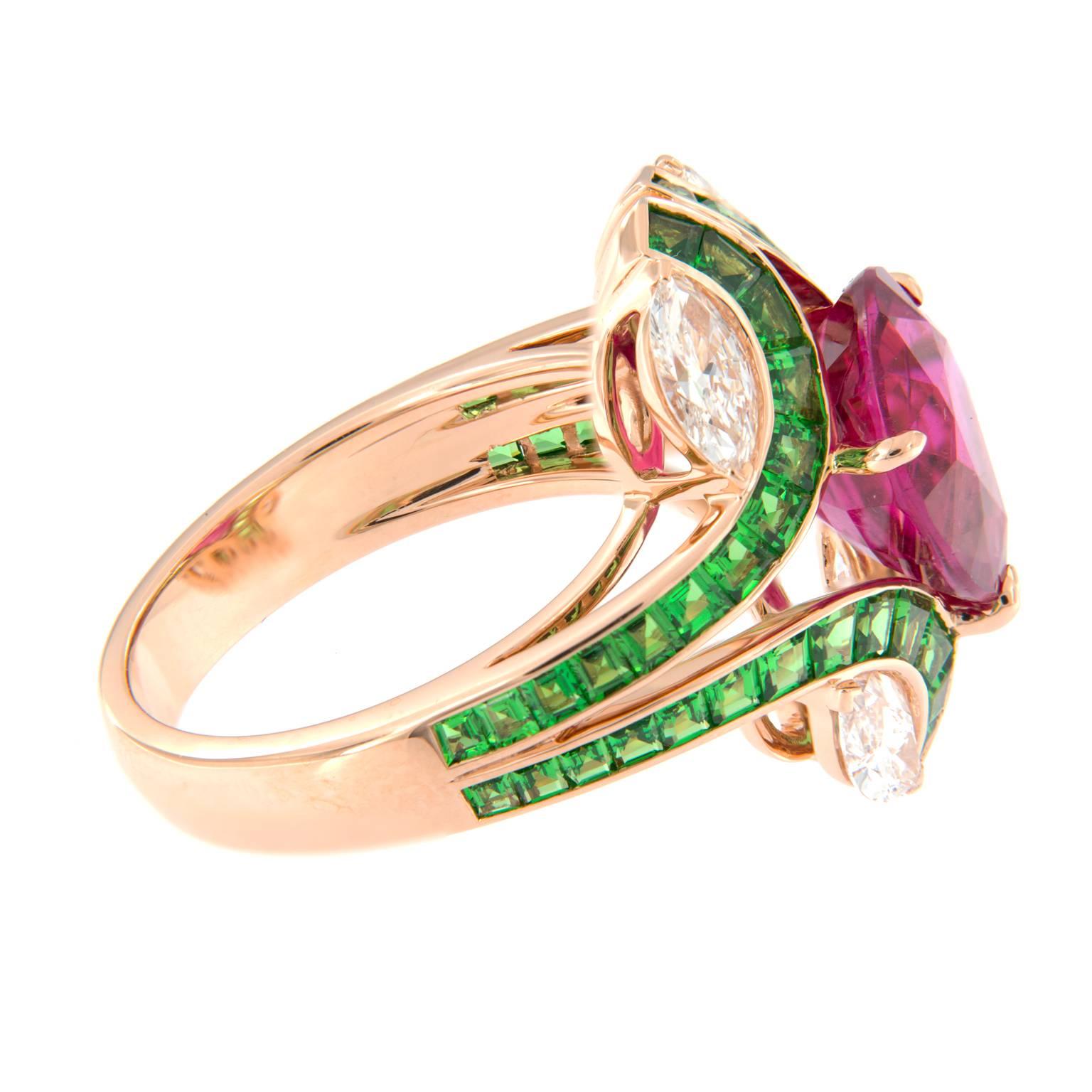 Stunning, colorful cocktail ring centers around a 3.5 carat ruby accented with tsavorite and diamonds. Expertly crafted in 18k rose gold. Ring size 6.75.Weighs 7.6 grams. 

Ruby 3.5 ct
Diamond 1.05 cttw
Tsavorite 1.88 ct
