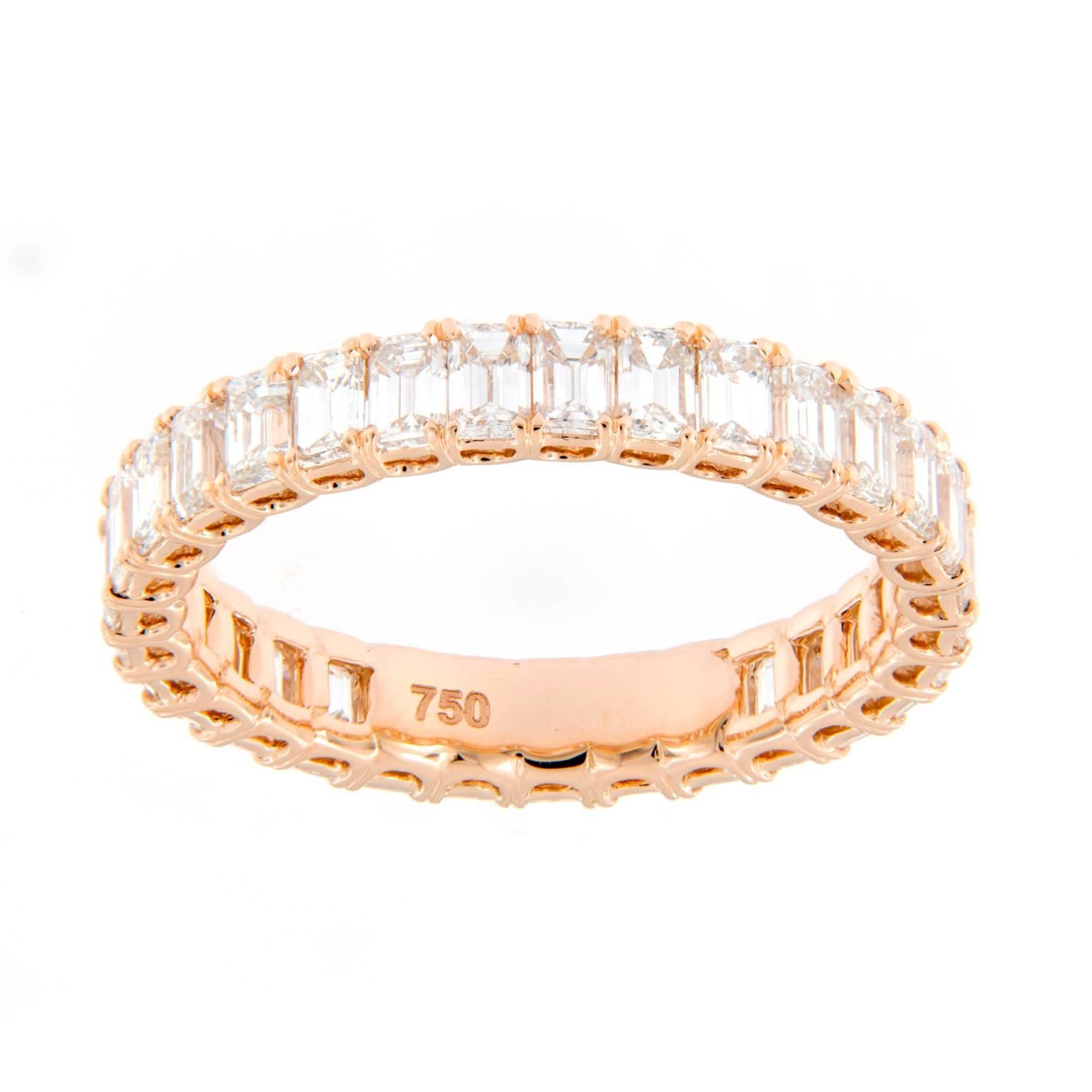 This stunning band features 31 baguette cut diamonds beautifully crafted in 18k rose gold. Ring size 6. Weighs 2.8 grams.

Diamond 2.66 cttw