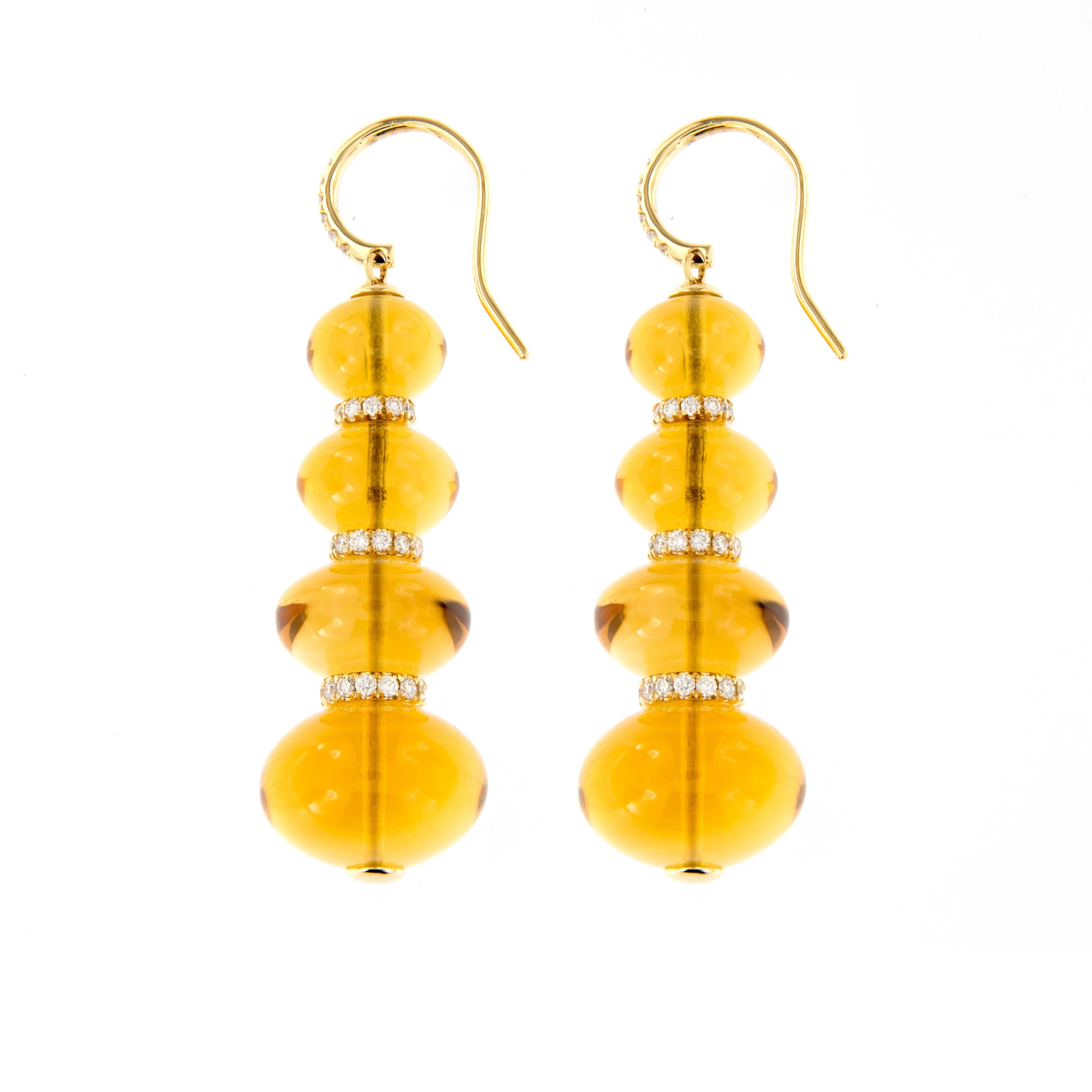 ‘Beyond’ 4-tier citrine bead earrings with diamond hook and diamond rondels in 18k yellow gold designed by Goshwara. Weigh 20.7 grams.

Citrine 78.97 cttw
Diamond 0.92 ct
