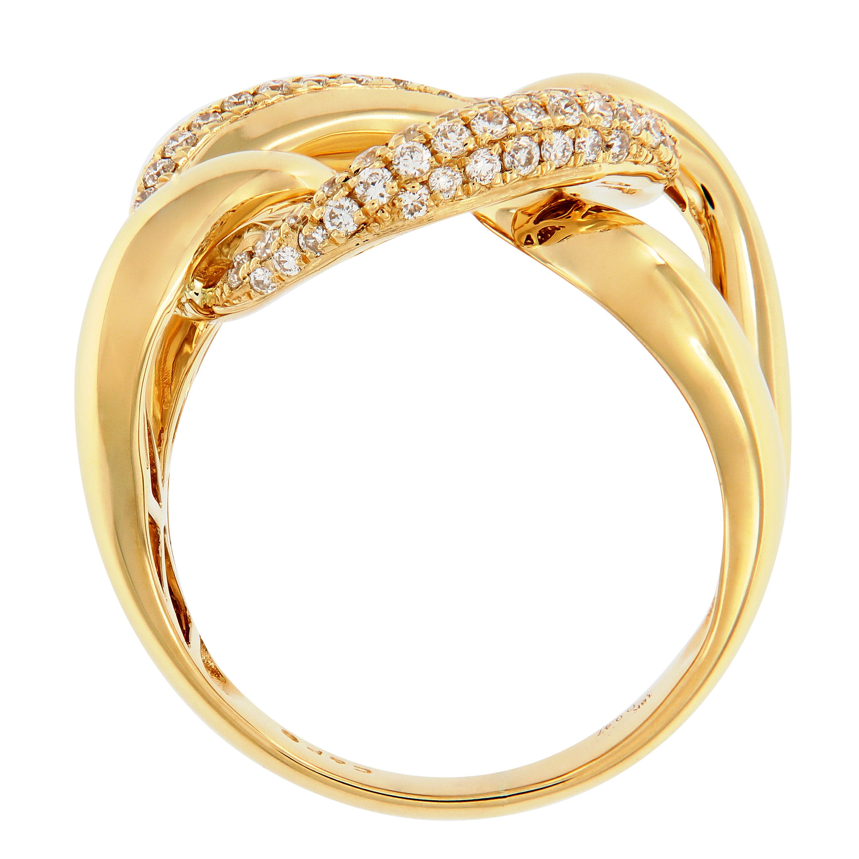 Contemporary open knot ring crafted in 18k yellow gold accented with pave set diamonds. Top of ring measures approximately 16.4mm x 21mm. Ring size 6.25. Weighs 7.5 grams.
Diamonds 0.47 cttw