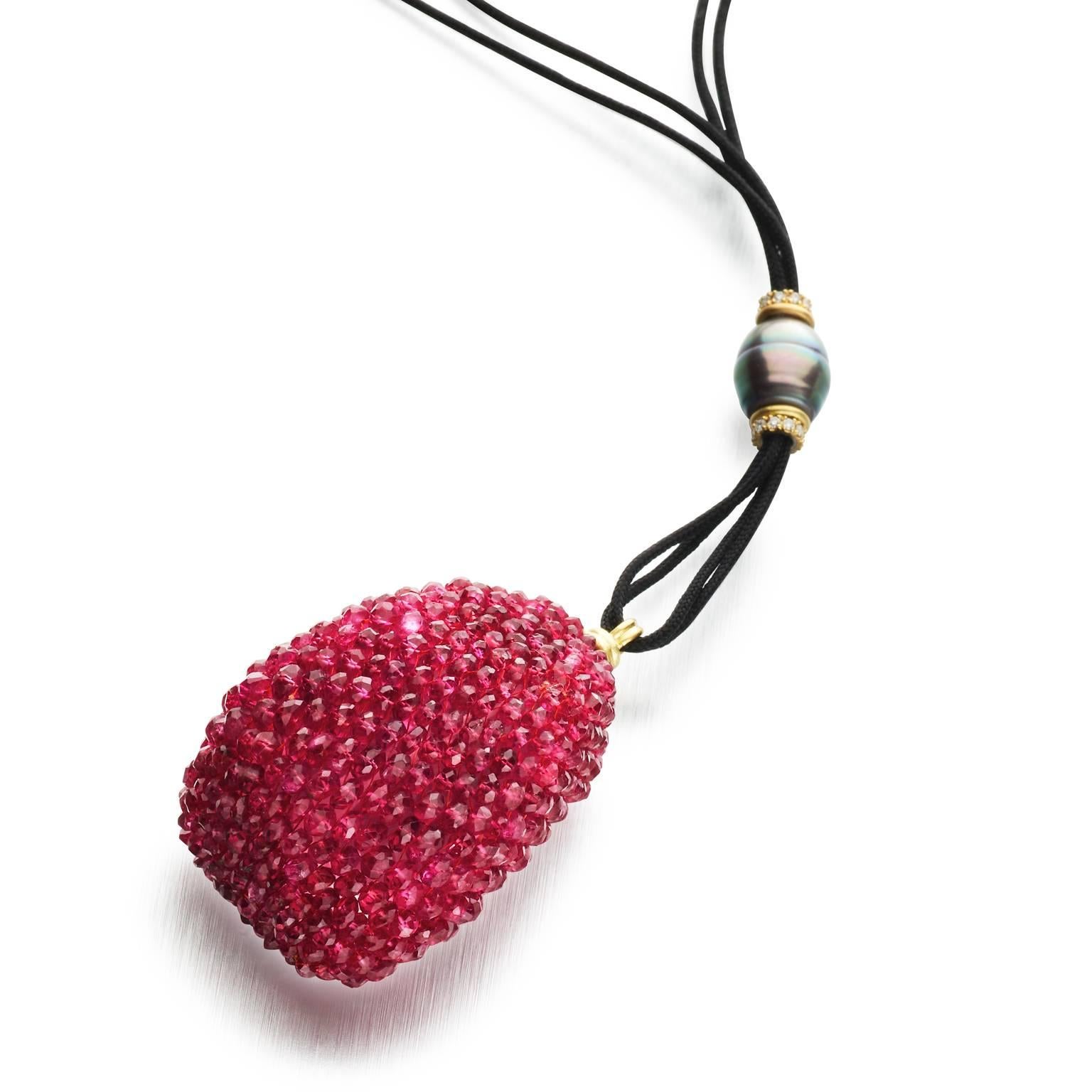 This expertly crafted necklace by award winning designer Susan Hoge is warm against the skin and the glowing jewel imparts a feeling of calmness to the wearer. Each faceted spinel bead is individually chosen and joined to others equally lovely to