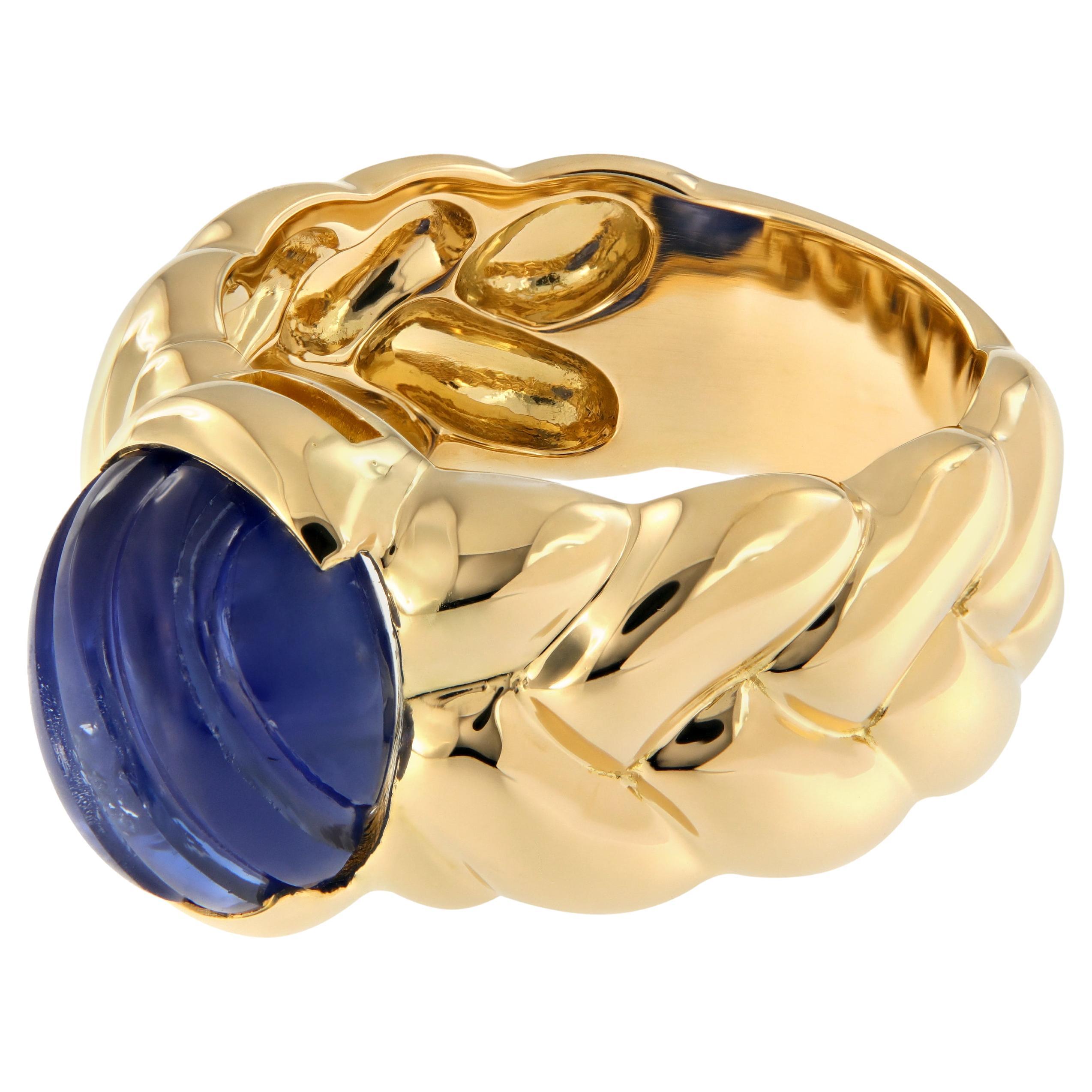 Hand Carved Oval Cabochon Blue Sapphire 18 Karat Yellow Gold Ring For Sale