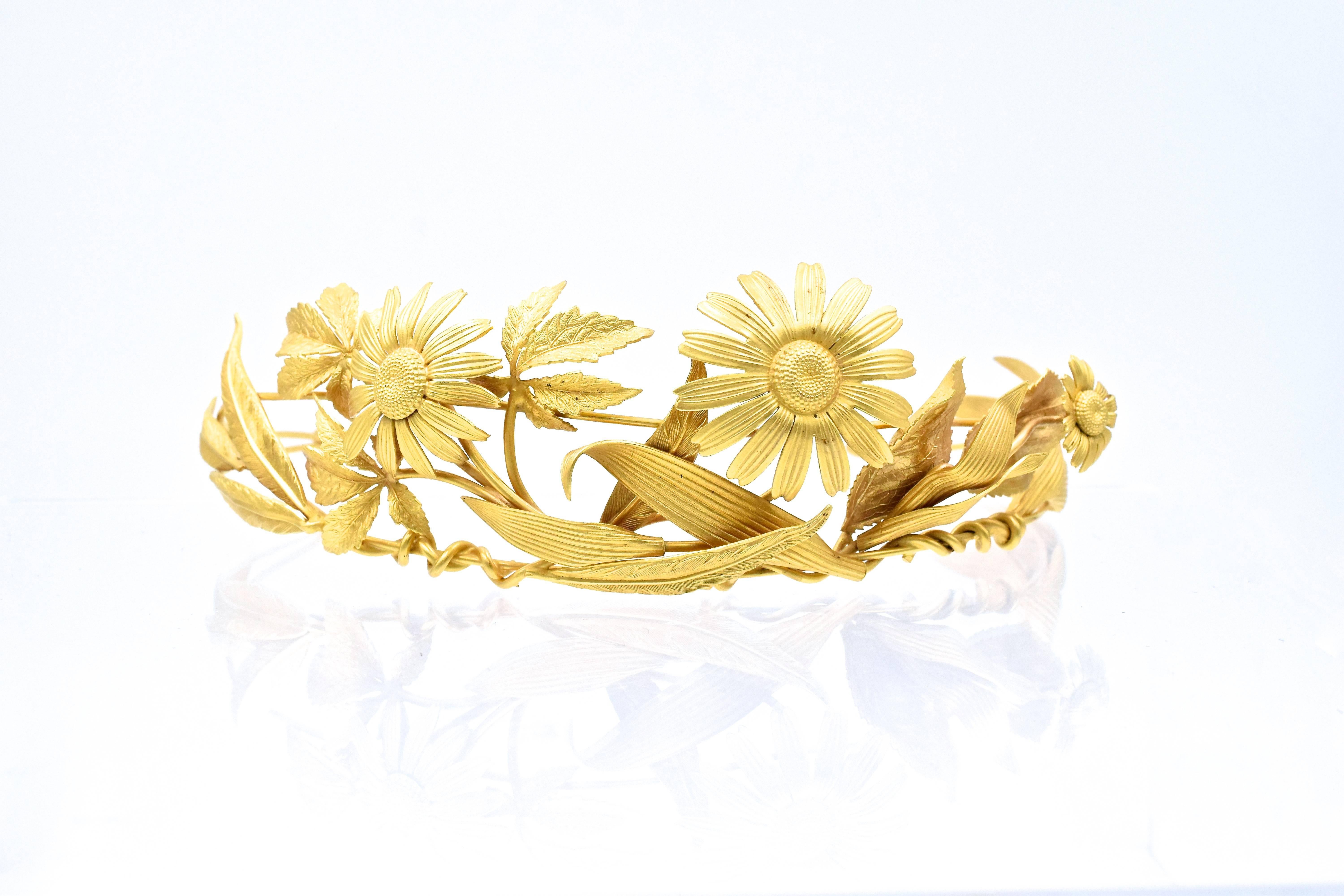 This is the year of tiara in Hollywood! 
 Beautiful Vermeil  tiara with floral design by Hermes.
Silver with 18k gold plate


