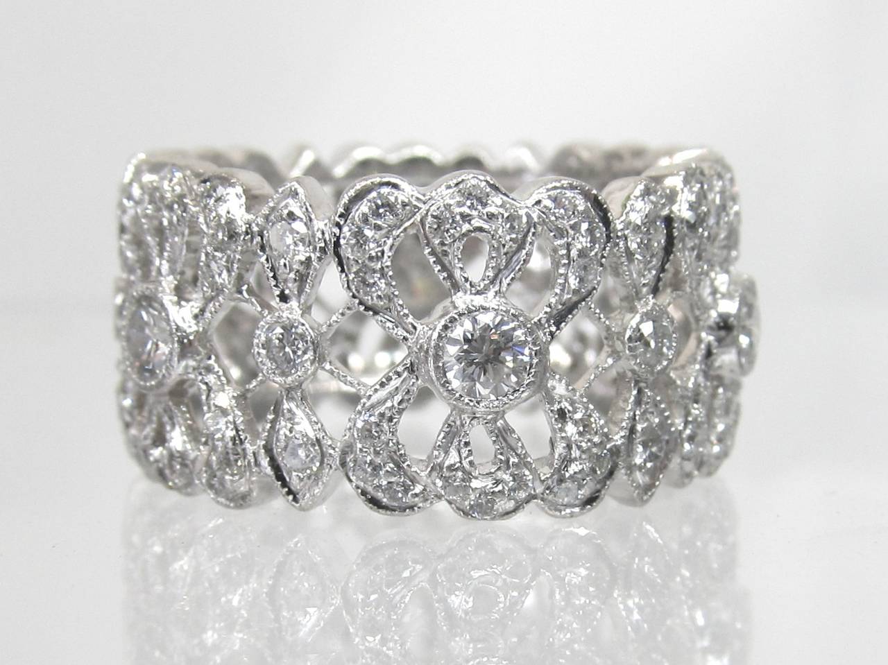 Elegant art deco designed diamond band with detailed workmanship!
Brilliant diamonds approximately 1.40 carats  set in a platinum setting.
Ring size is 6.5 
Width of the band is 11mm
