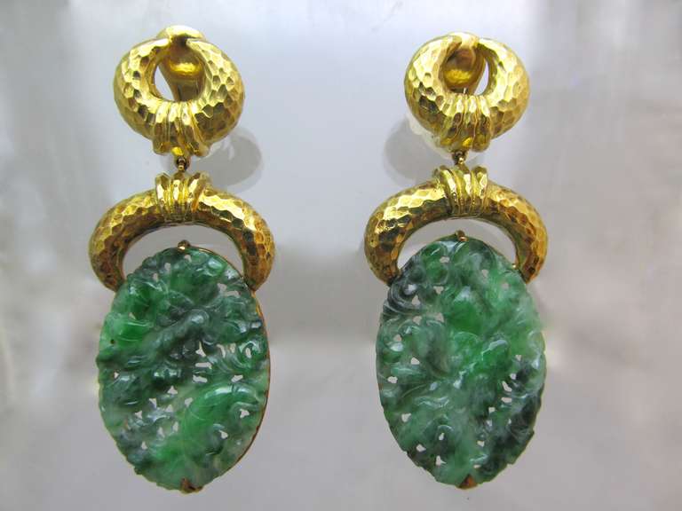 David Webb!
Impressive carved jade suspended from 18k gold hammered clips.
Signed:  David Webb