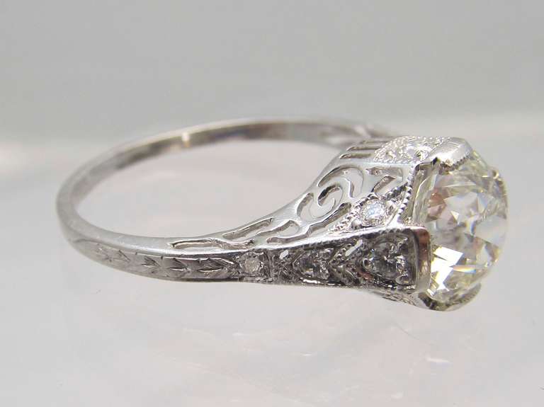 Beautiful!  Art Deco Diamond ring
 Impressive 1.70 carat near colorless Old Mine diamond set in platinum with detailed filigree workmanship.
Ring size is 6.3/4 ( resizable)